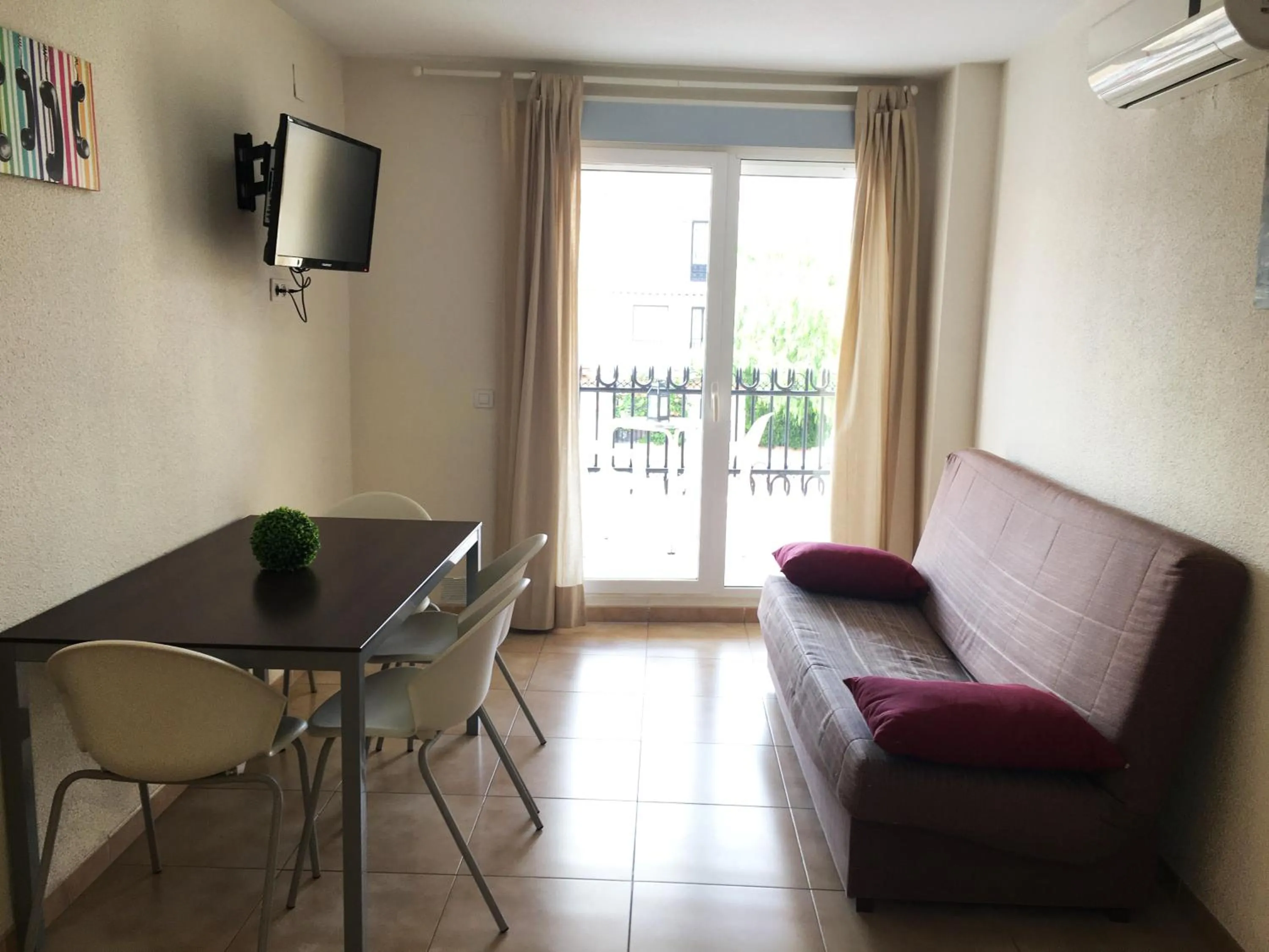 TV and multimedia in Apartamentos Doña Carmen 3000