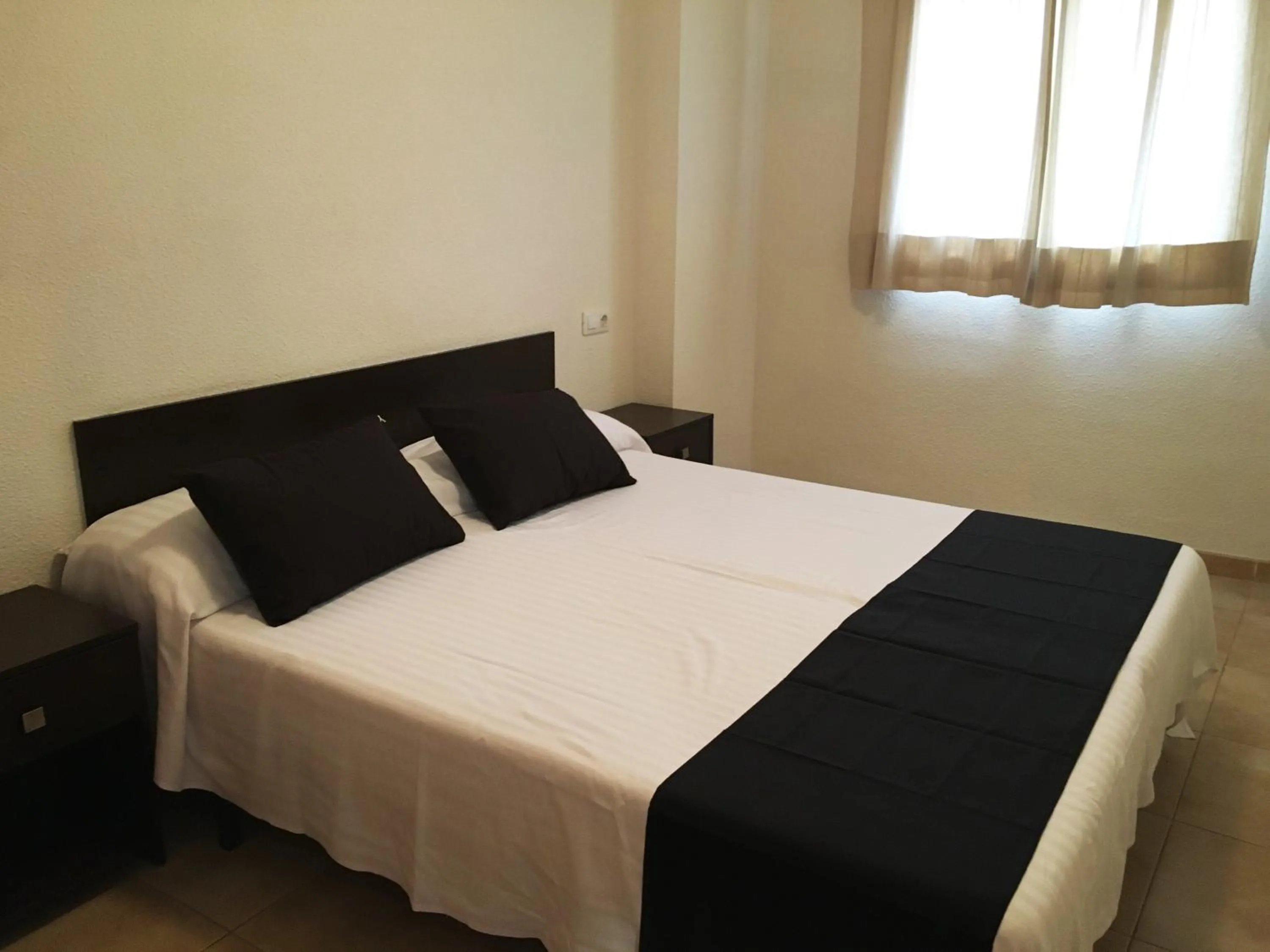 Bed in Apartamentos Doña Carmen 3000