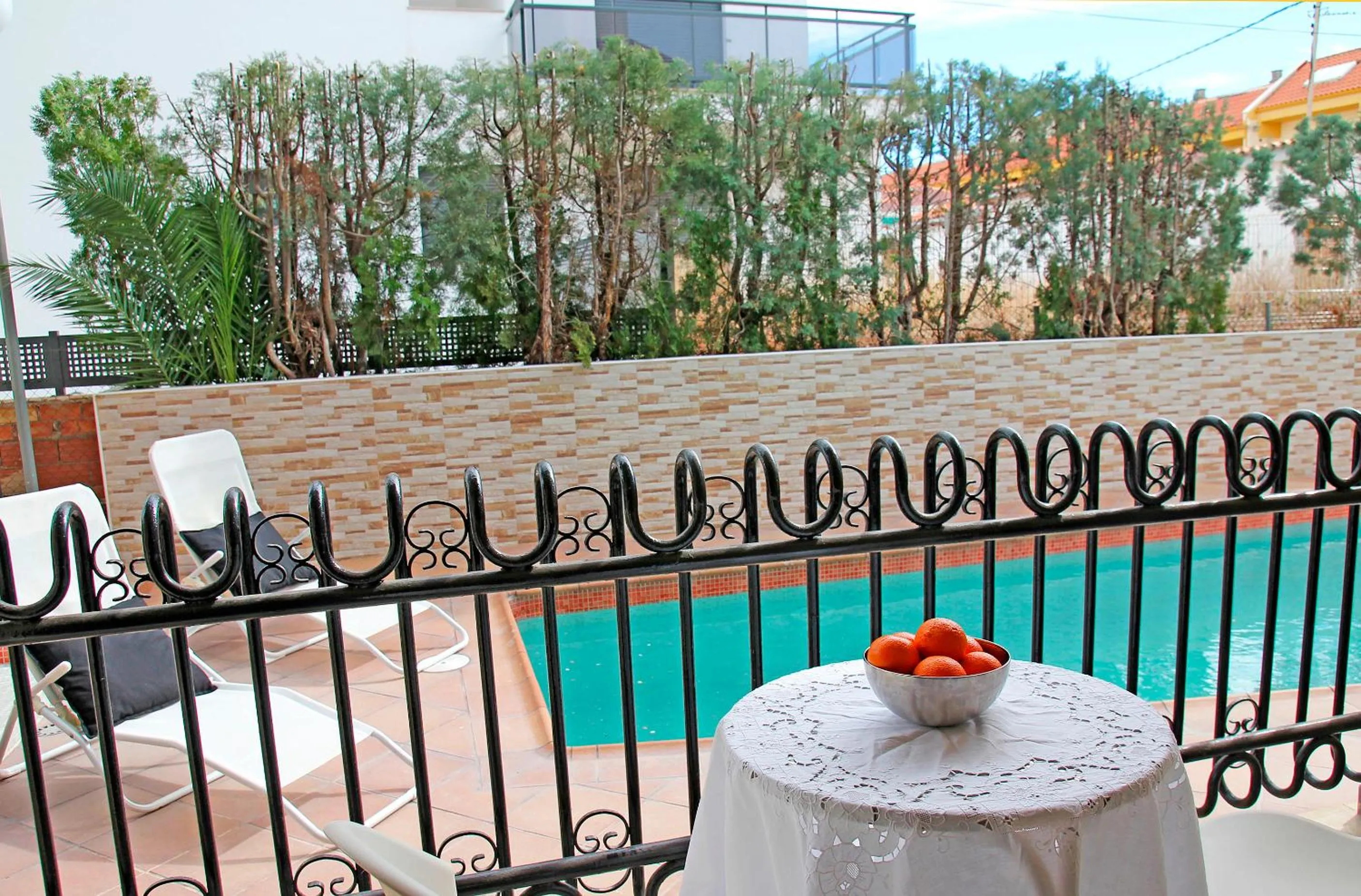 Swimming pool in Apartamentos Doña Carmen 3000