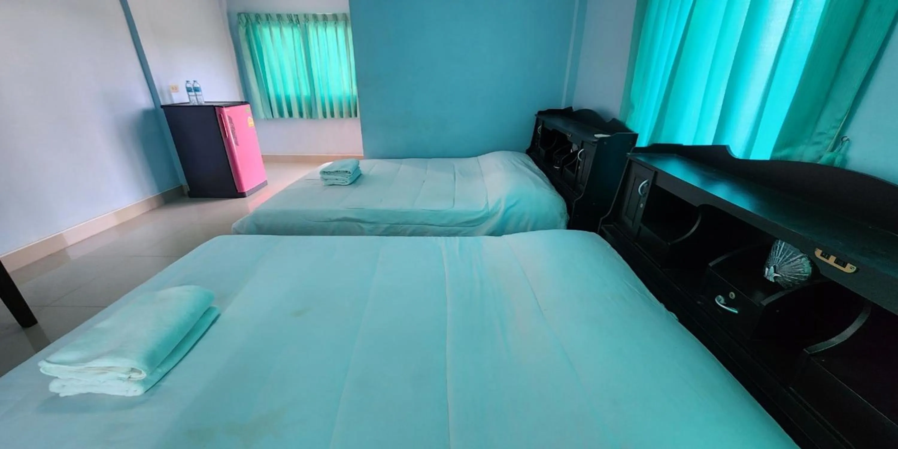 Bed in Chok Phikul Thong Resort