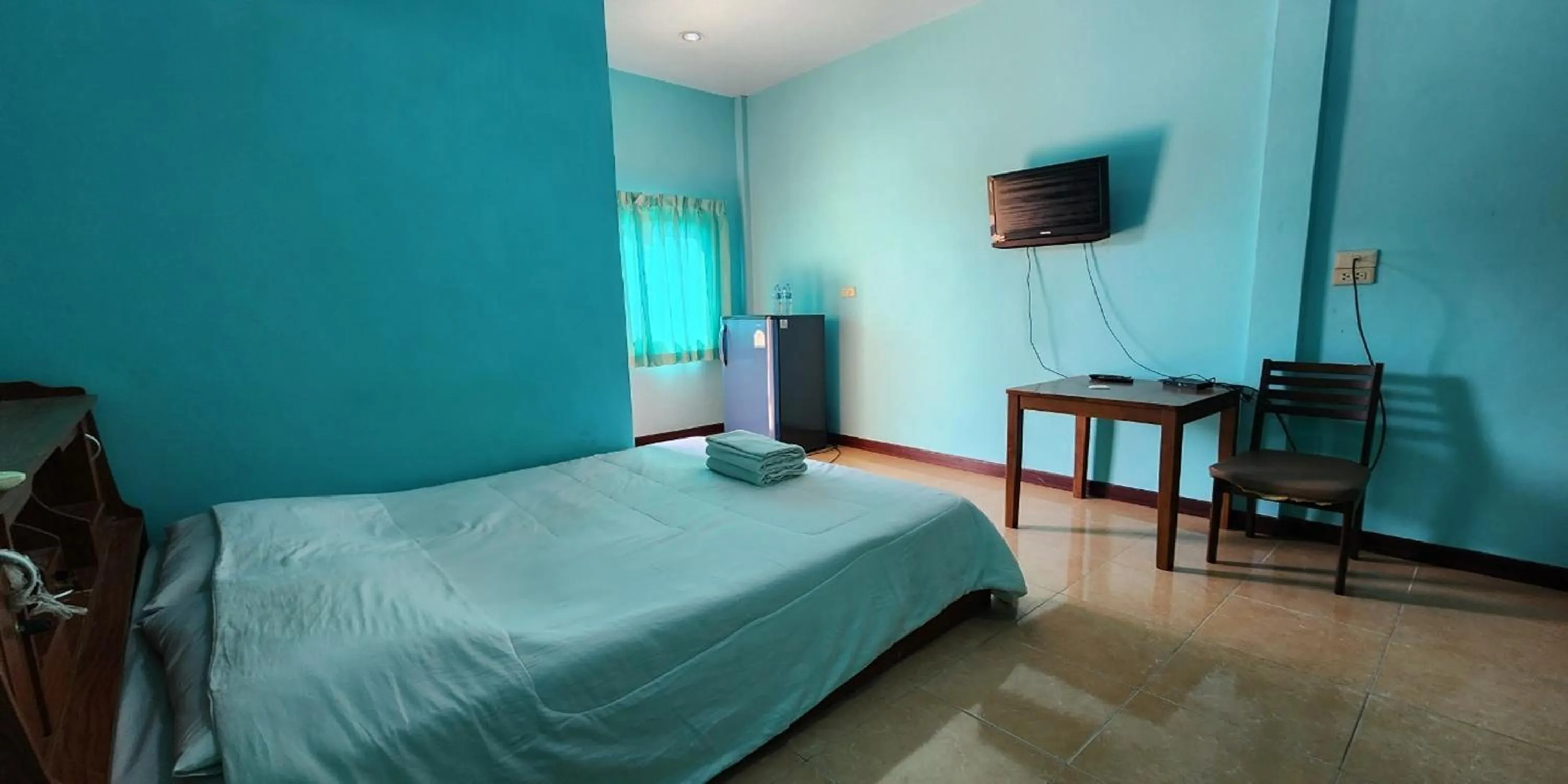 Bed in Chok Phikul Thong Resort