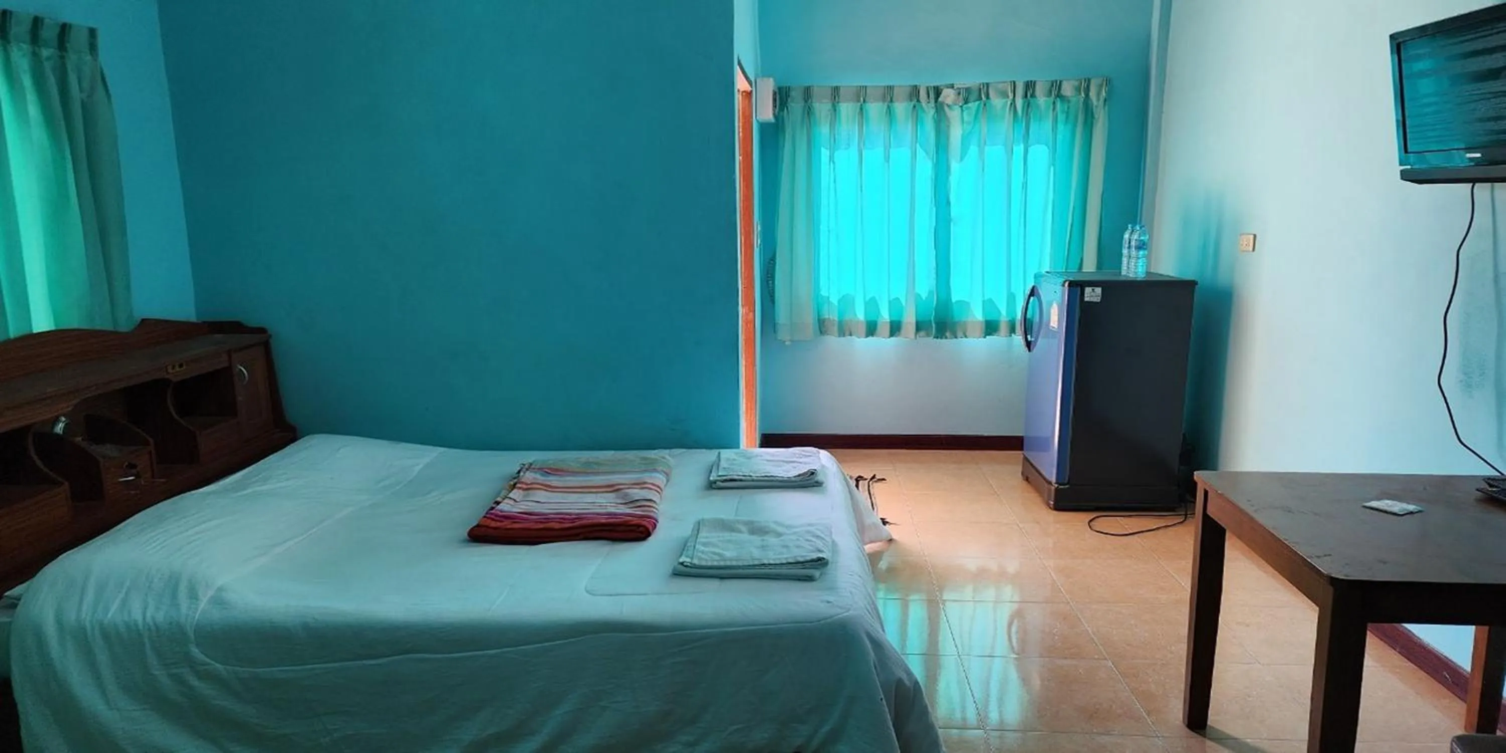 Bed in Chok Phikul Thong Resort
