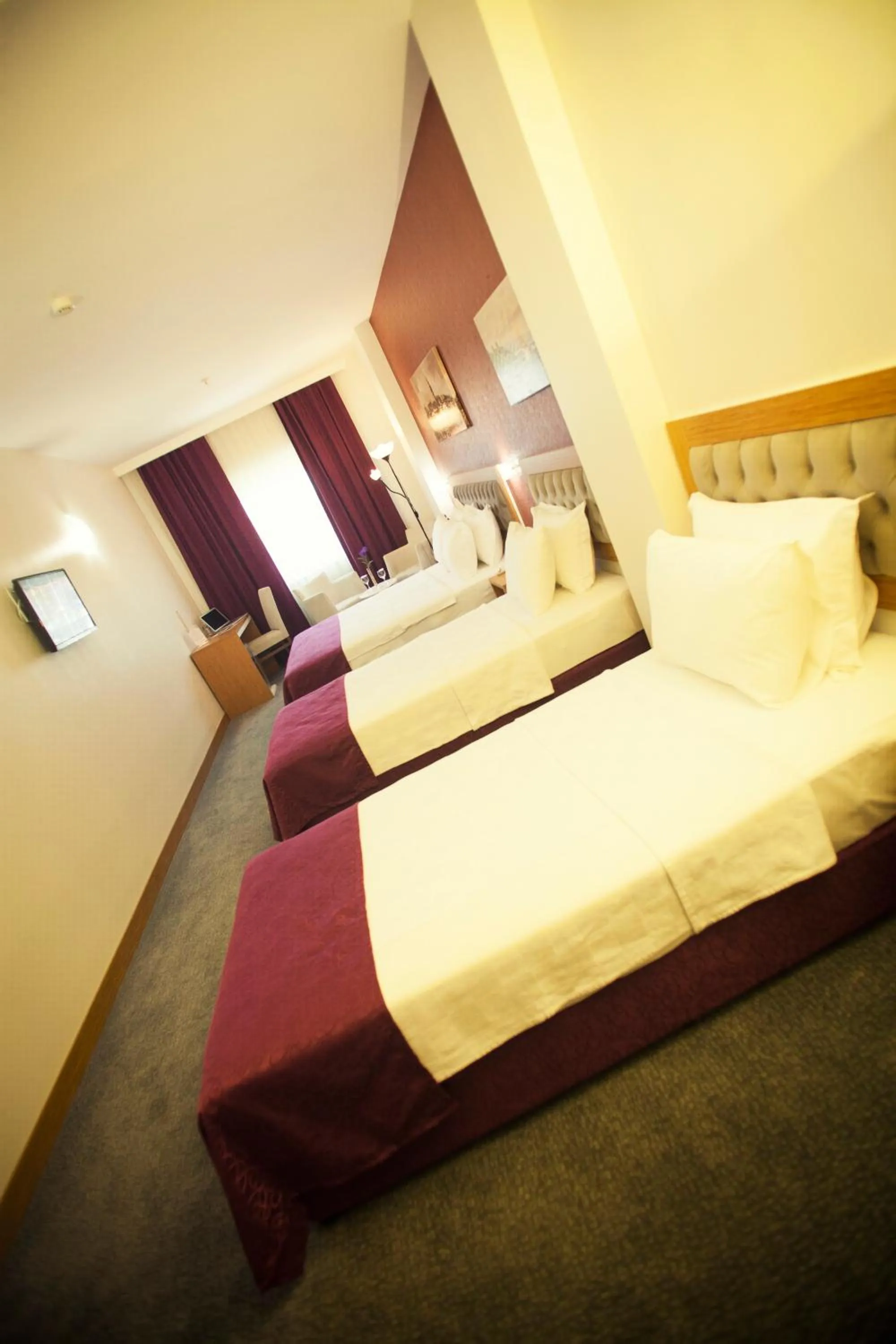 Bedroom in Helikon Business Hotel