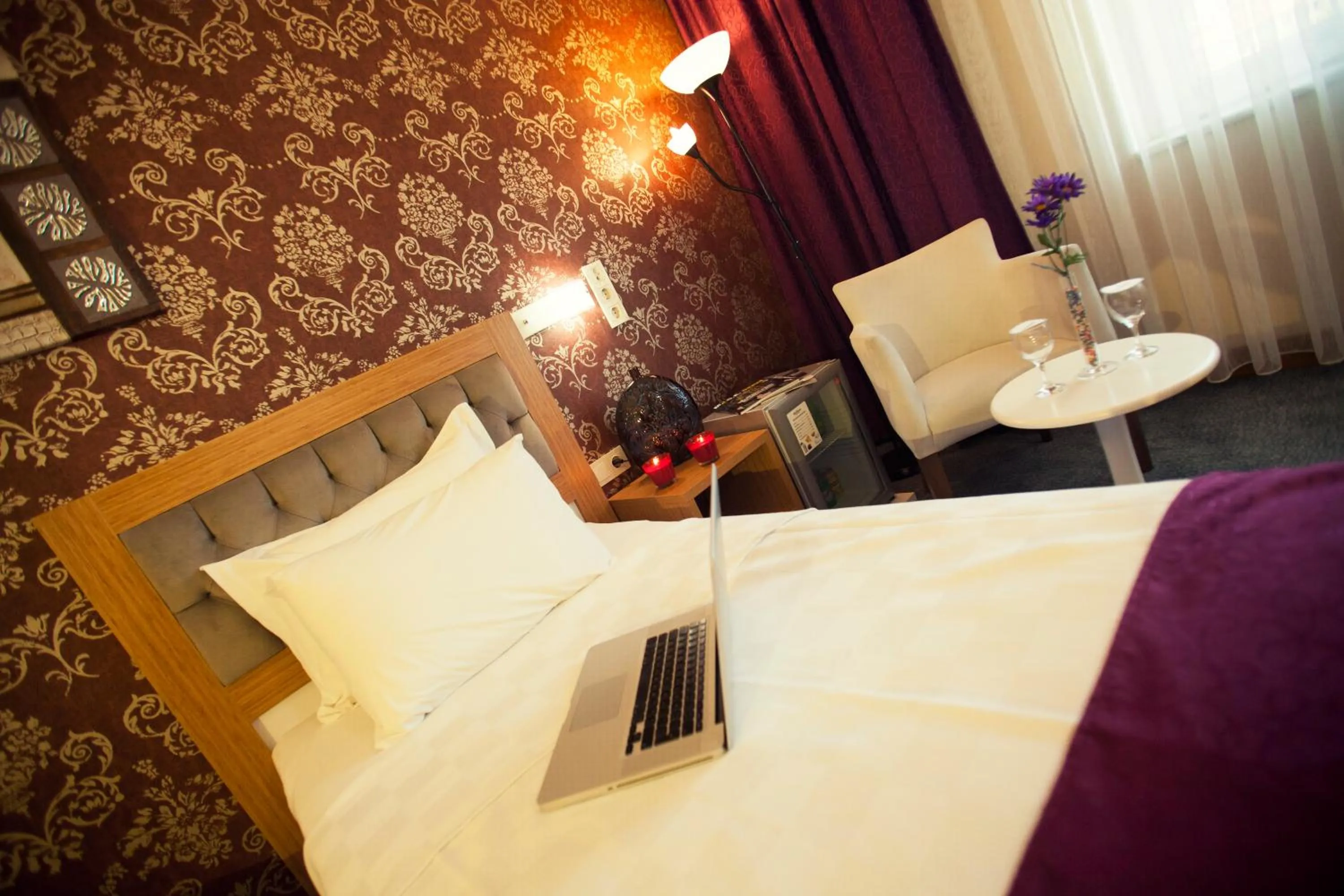 Bedroom in Helikon Business Hotel