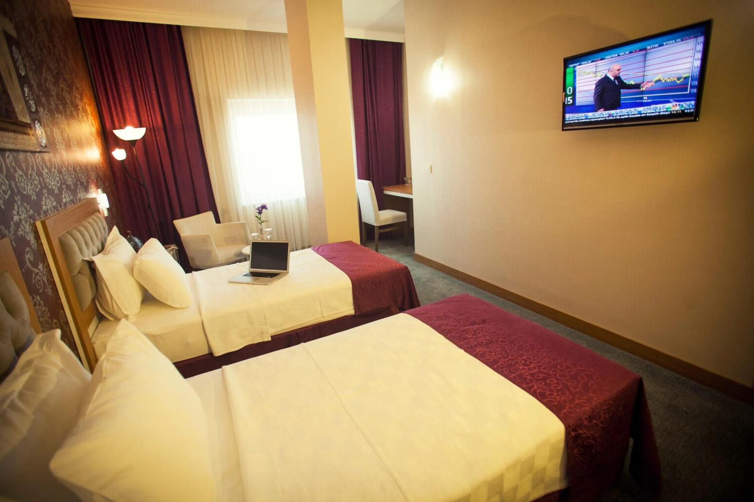 Bedroom in Helikon Business Hotel