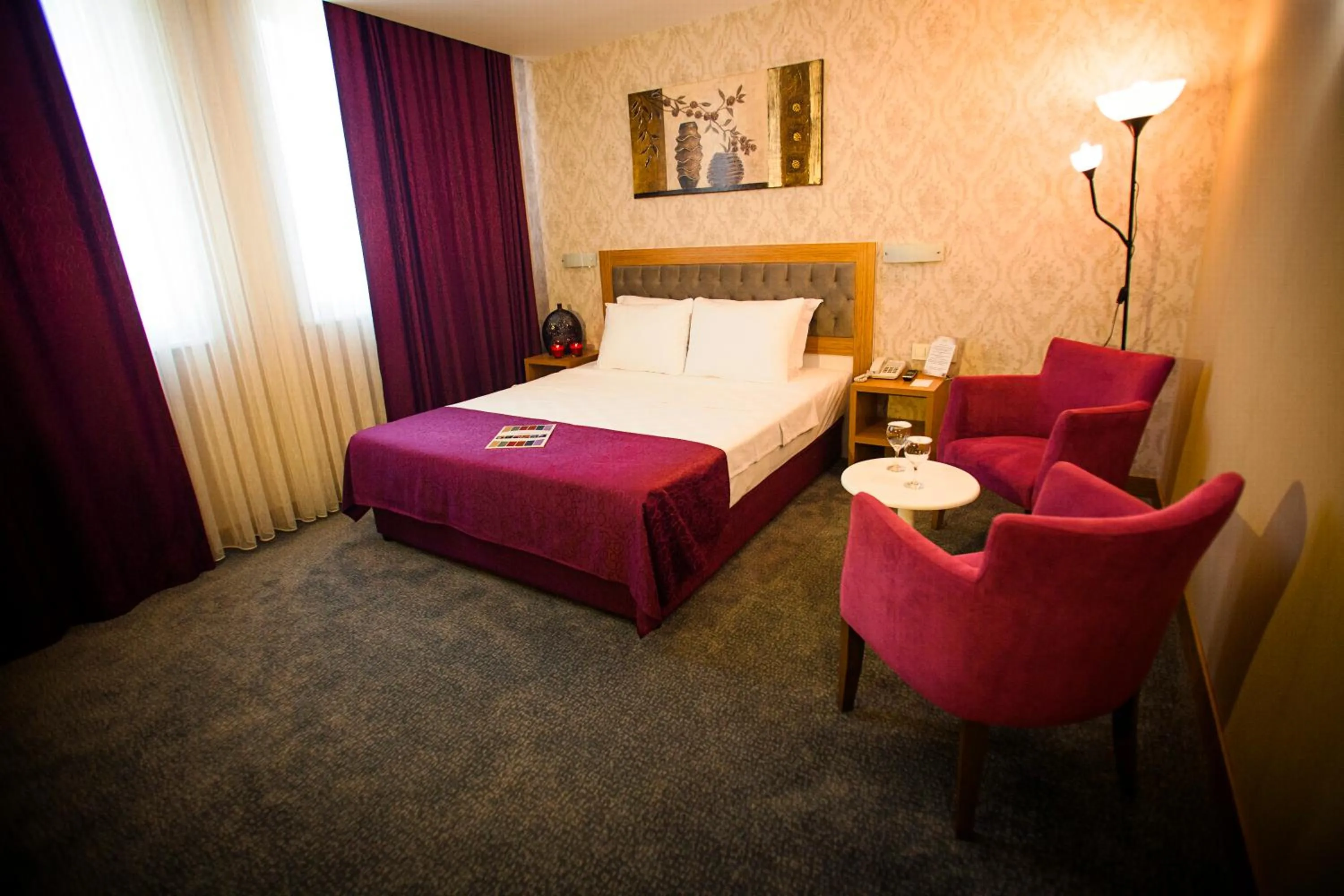 Bedroom in Helikon Business Hotel