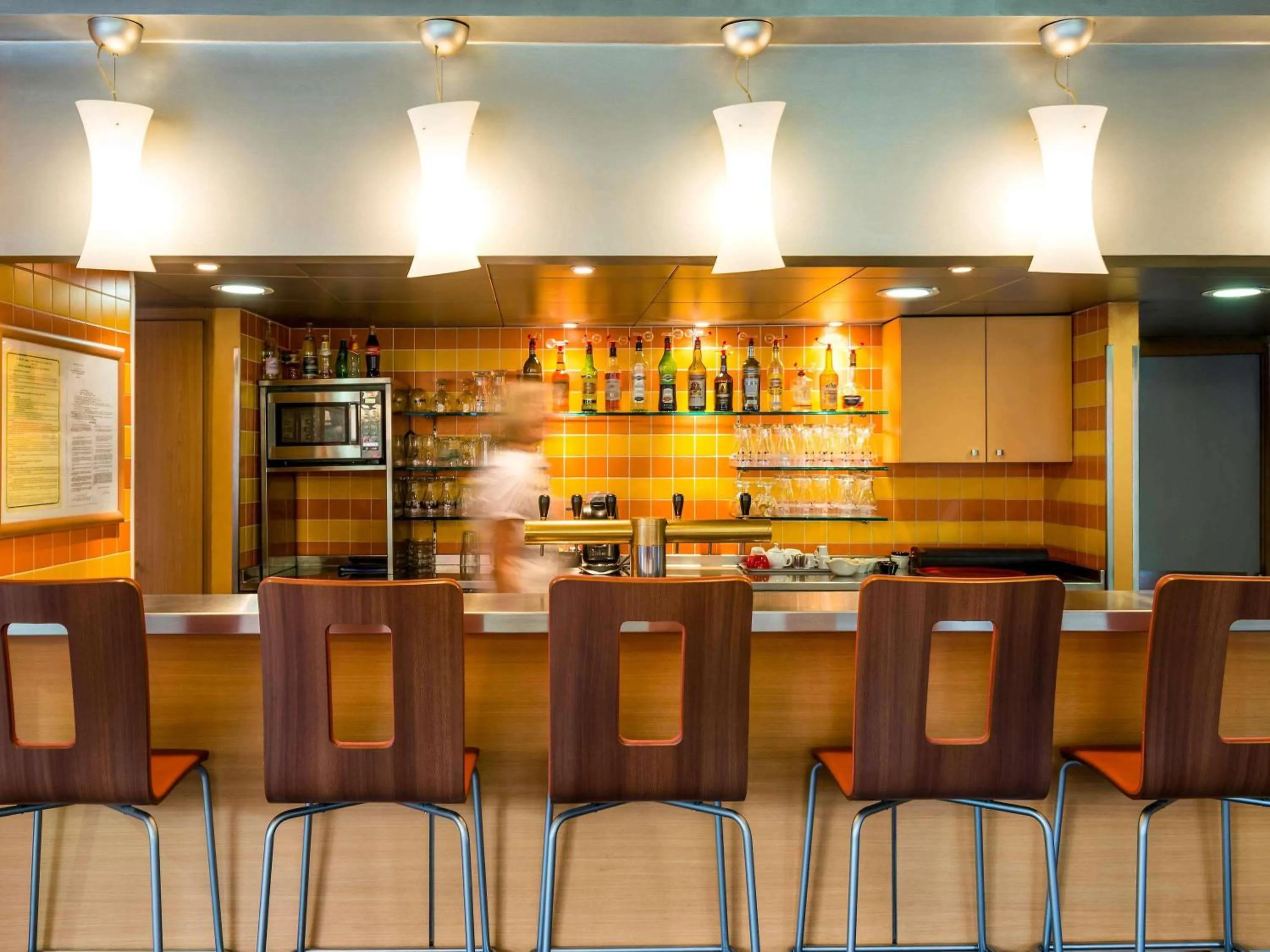 Lounge or bar in ibis Bourg en Bresse