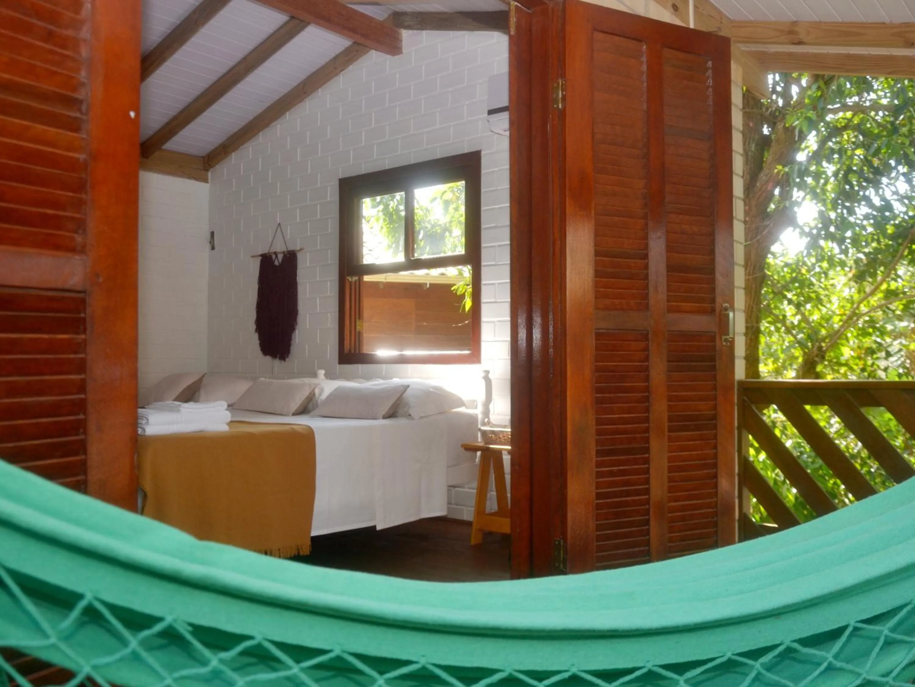 Balcony/Terrace, Bed in Pousada la Boheme Guarda do Embaú - SC