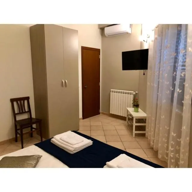 Photo of the whole room, Bed in B&B Luminari