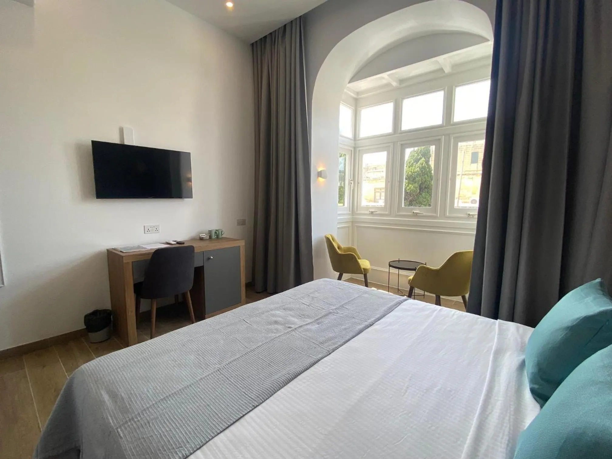 Bed in Tritoni Valletta Boutique Hotel