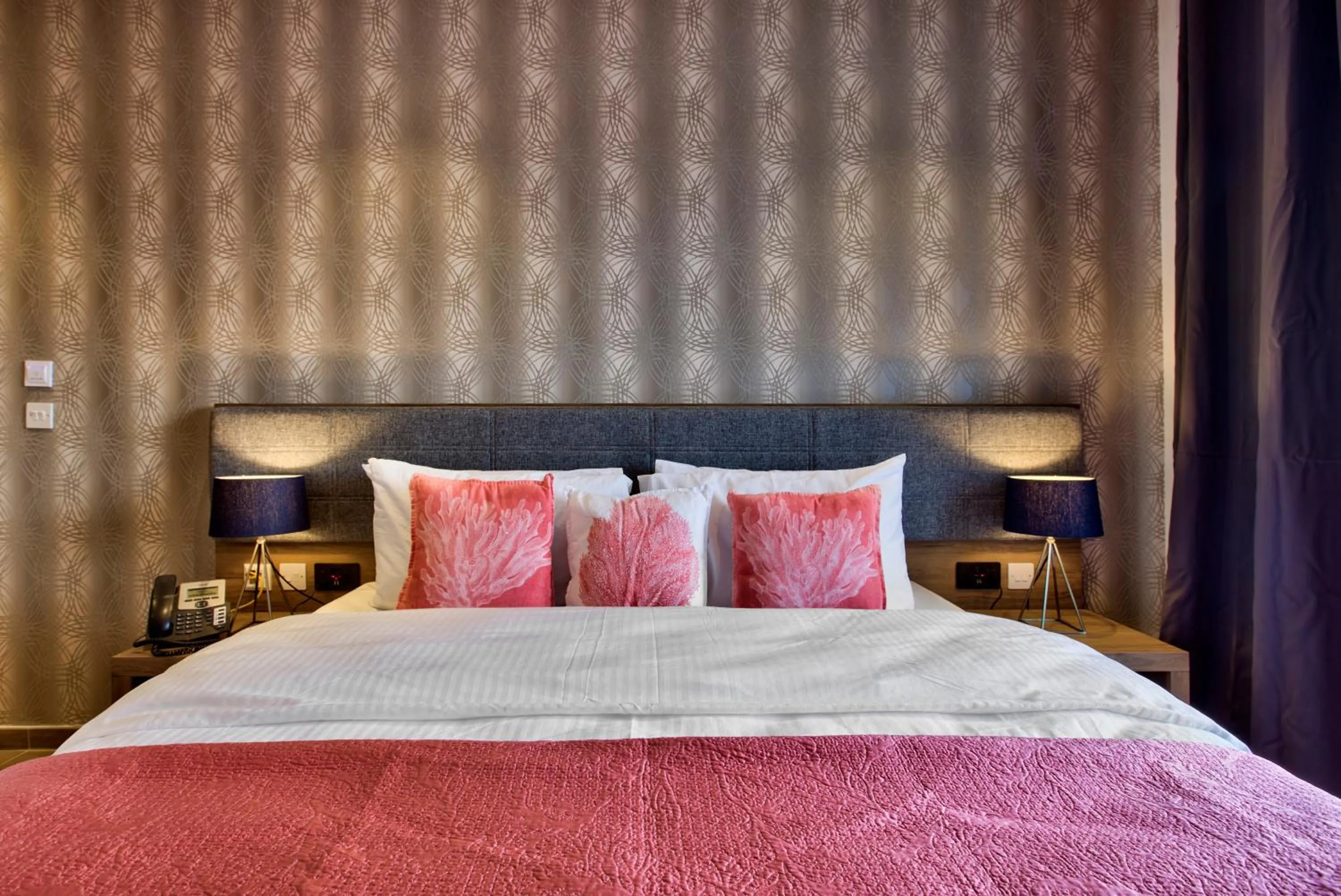 Bed in Tritoni Valletta Boutique Hotel