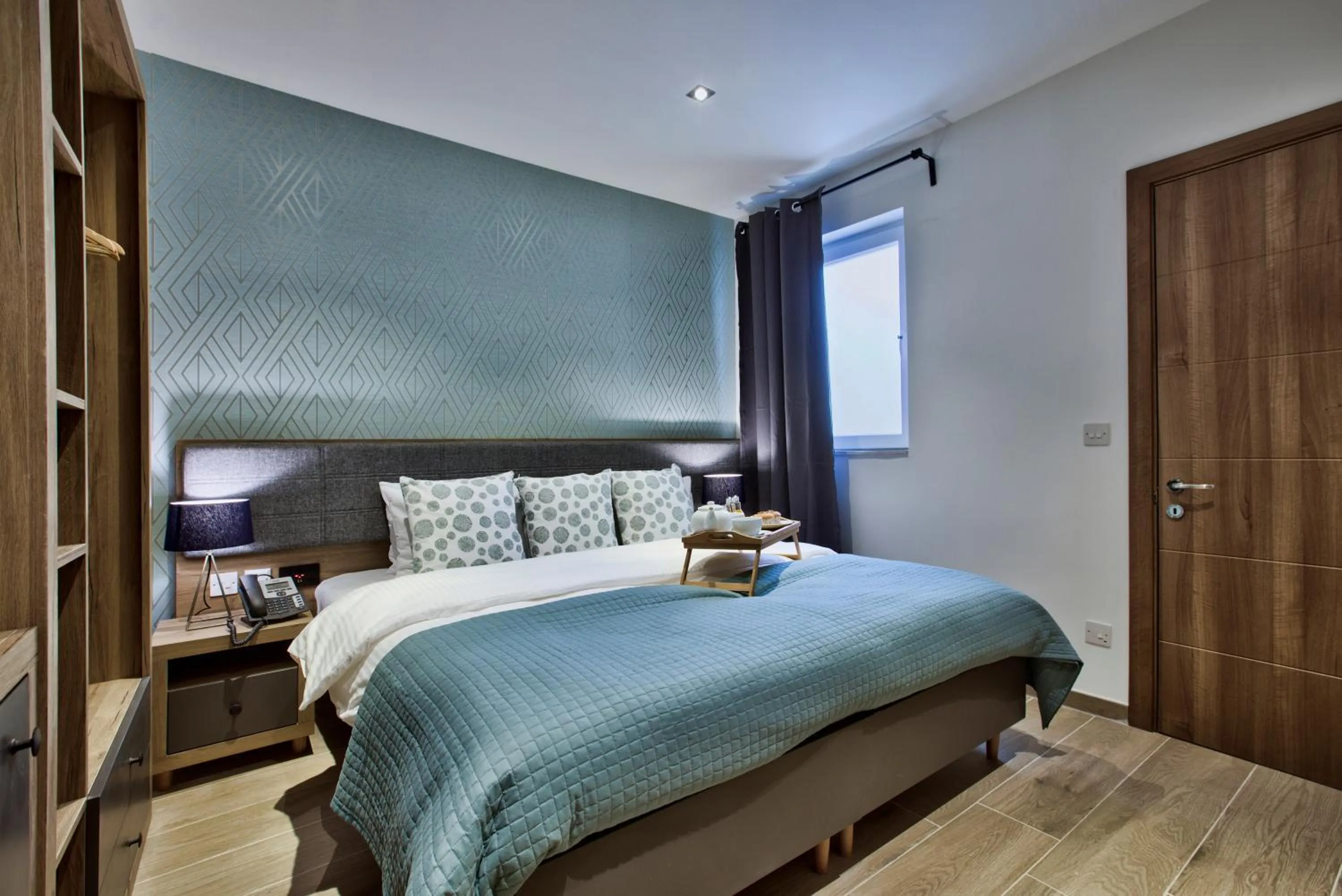 Bed in Tritoni Valletta Boutique Hotel