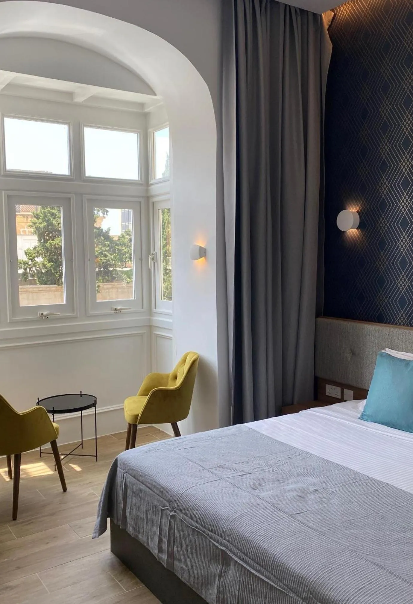 Bed in Tritoni Valletta Boutique Hotel