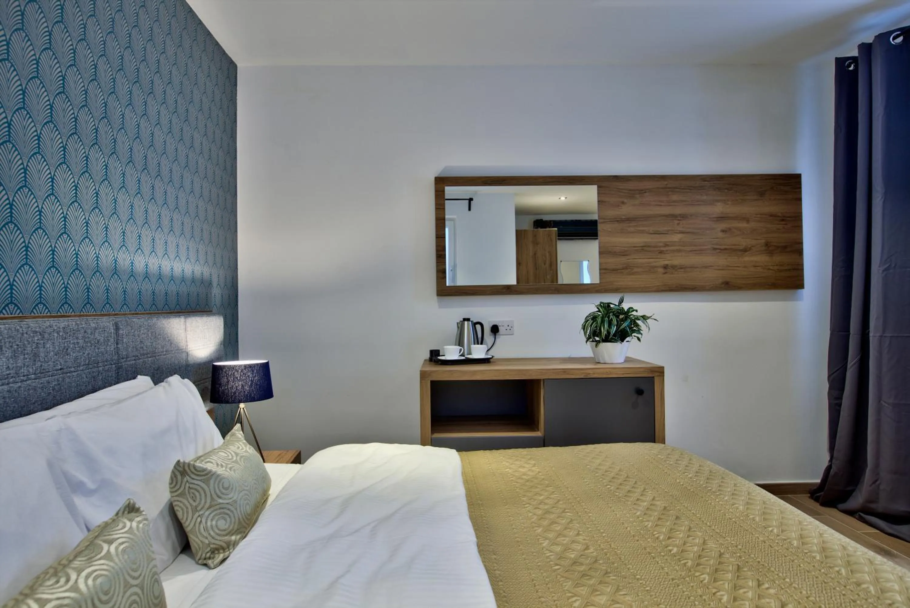 Bed in Tritoni Valletta Boutique Hotel