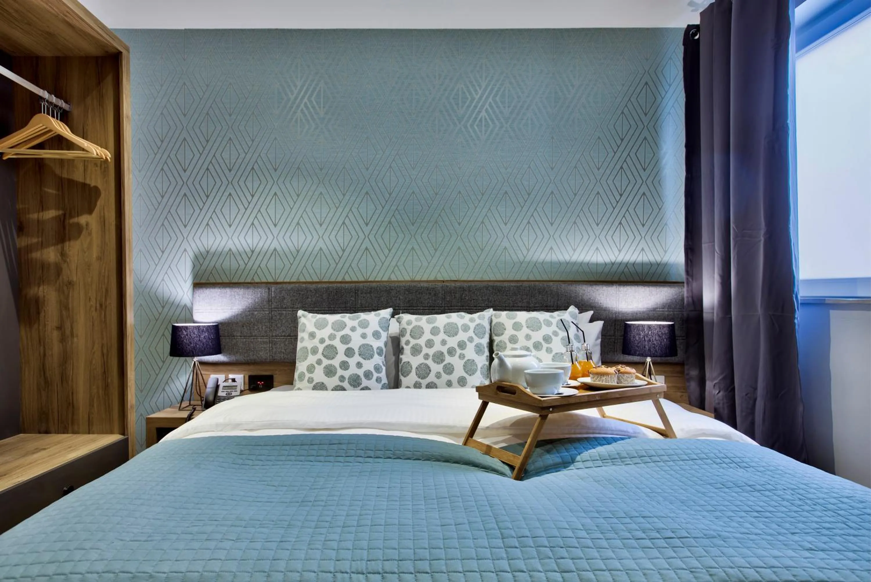 Bed in Tritoni Valletta Boutique Hotel