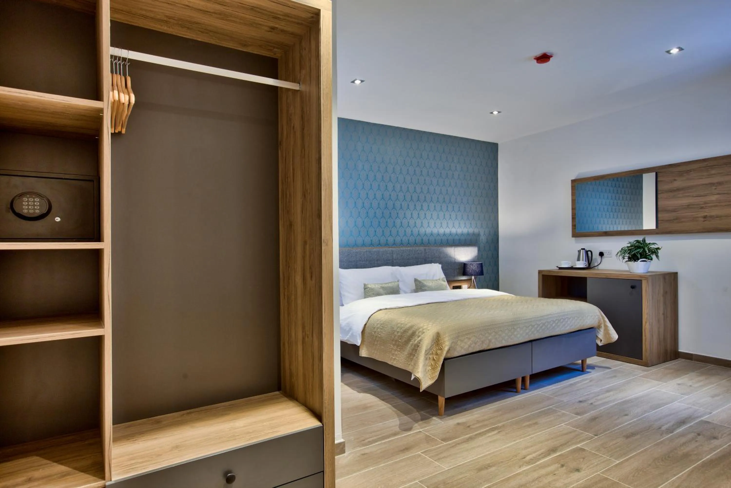 Bed in Tritoni Valletta Boutique Hotel