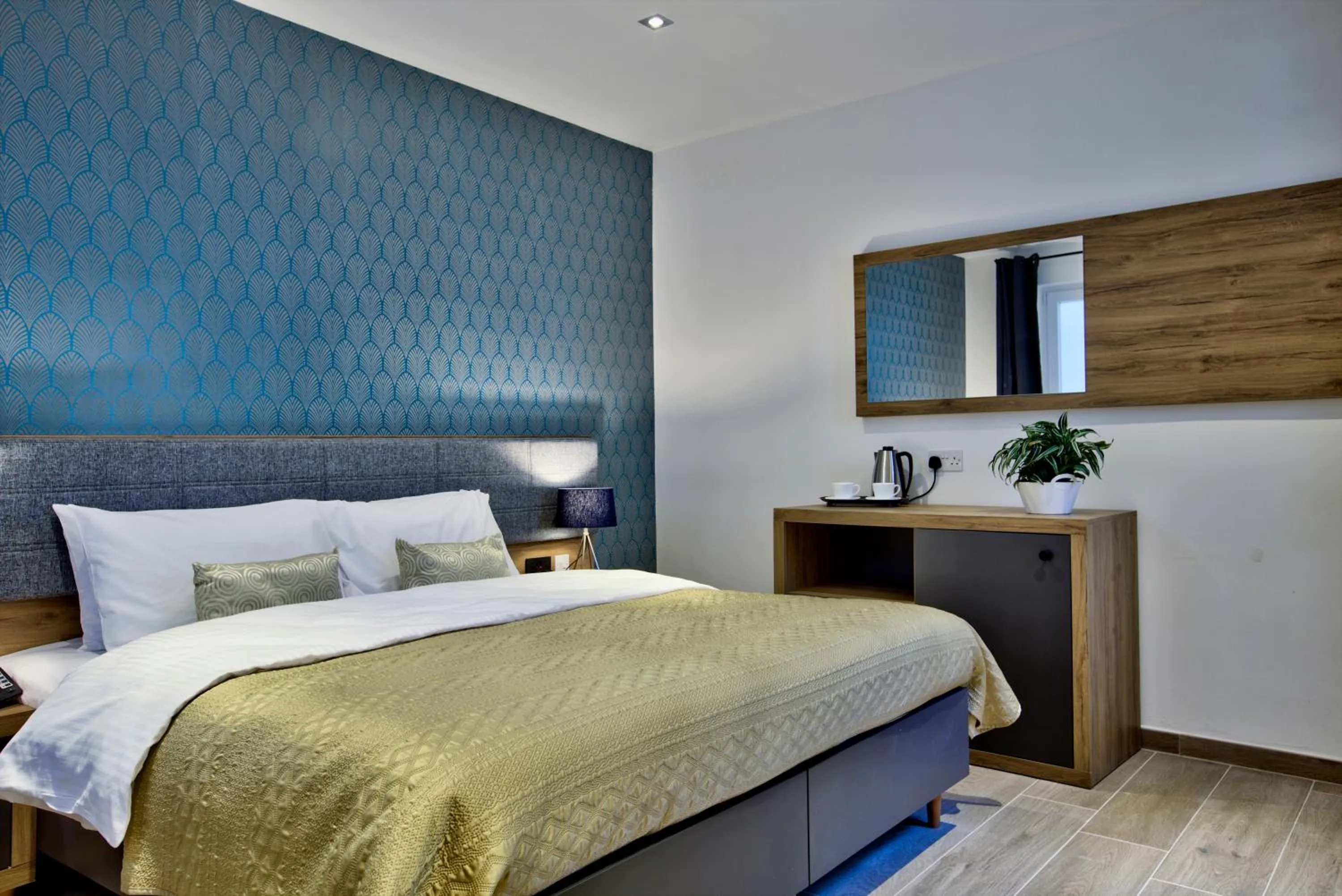 Bed in Tritoni Valletta Boutique Hotel