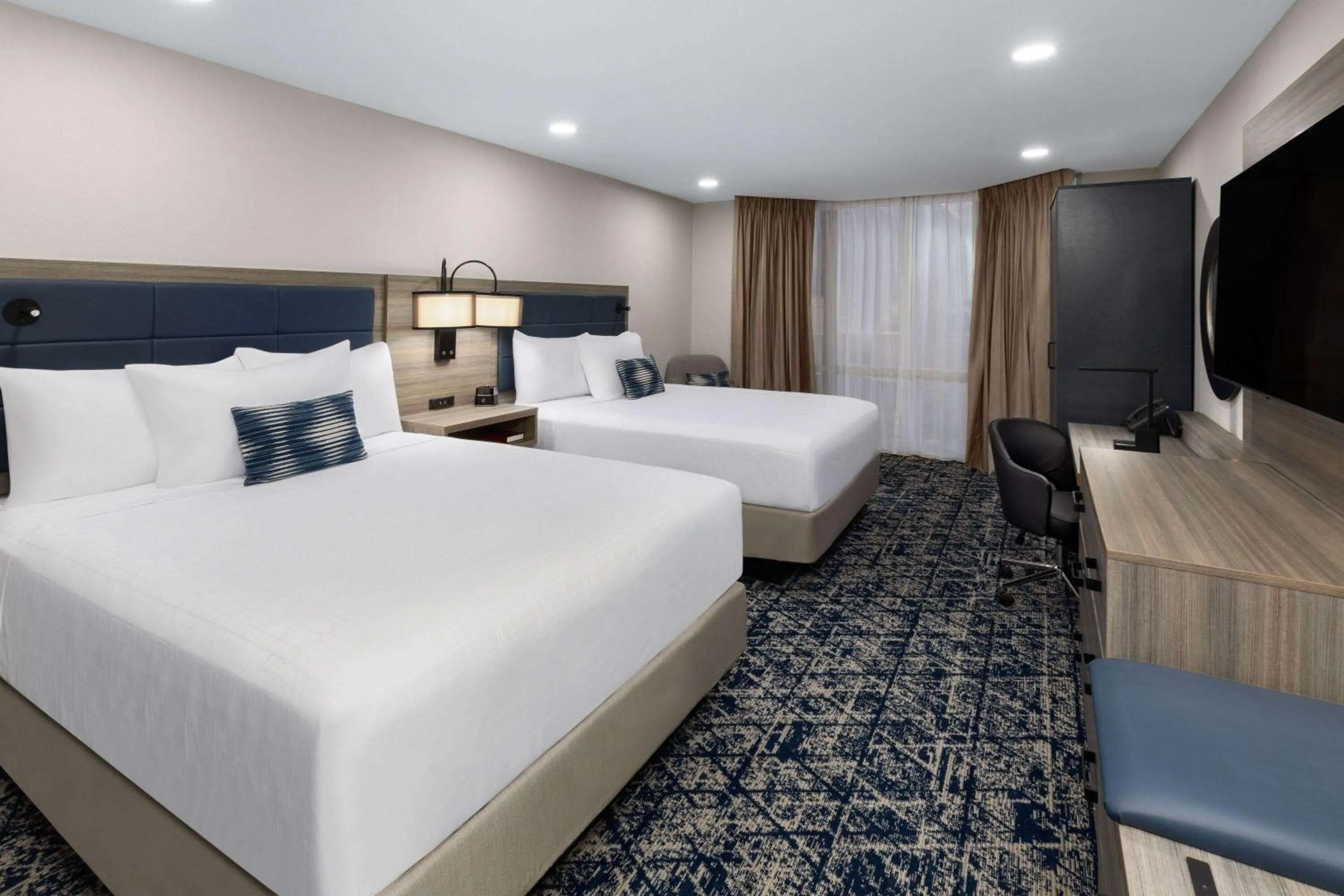 Photo of the whole room, Bed in Wyndham DFW Airport