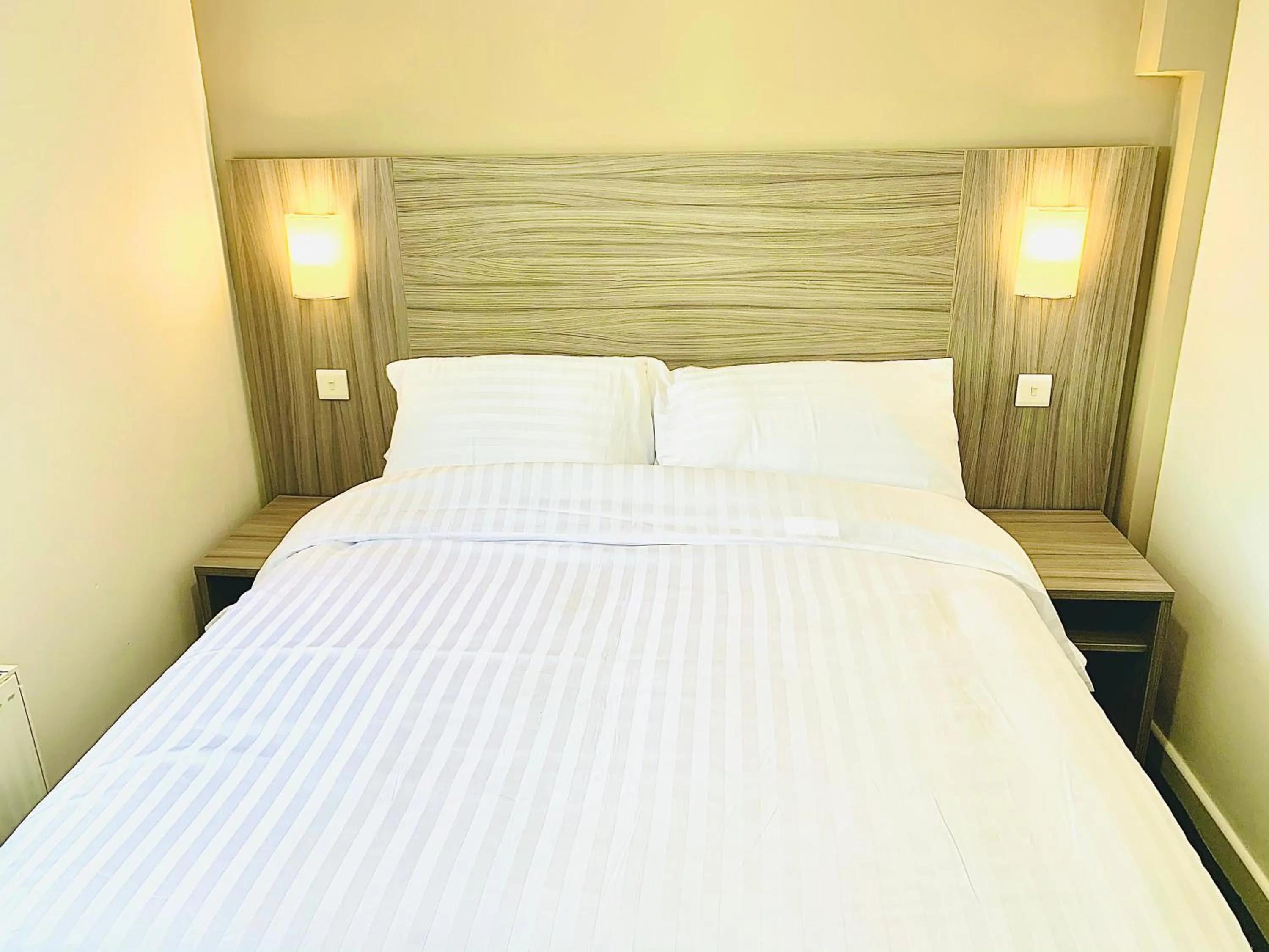 Bed in De Regency Style Hotel