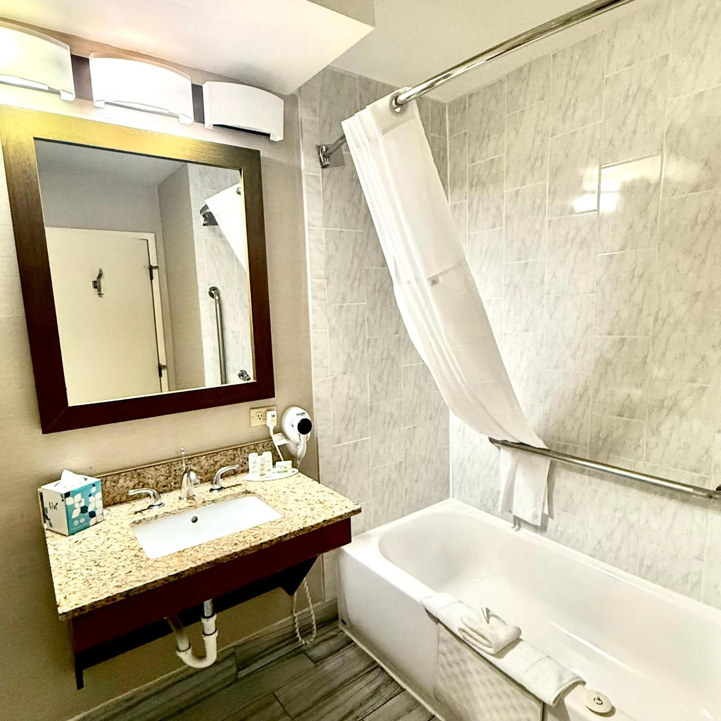 Bathroom in Ramada by Wyndham Denver International Airport