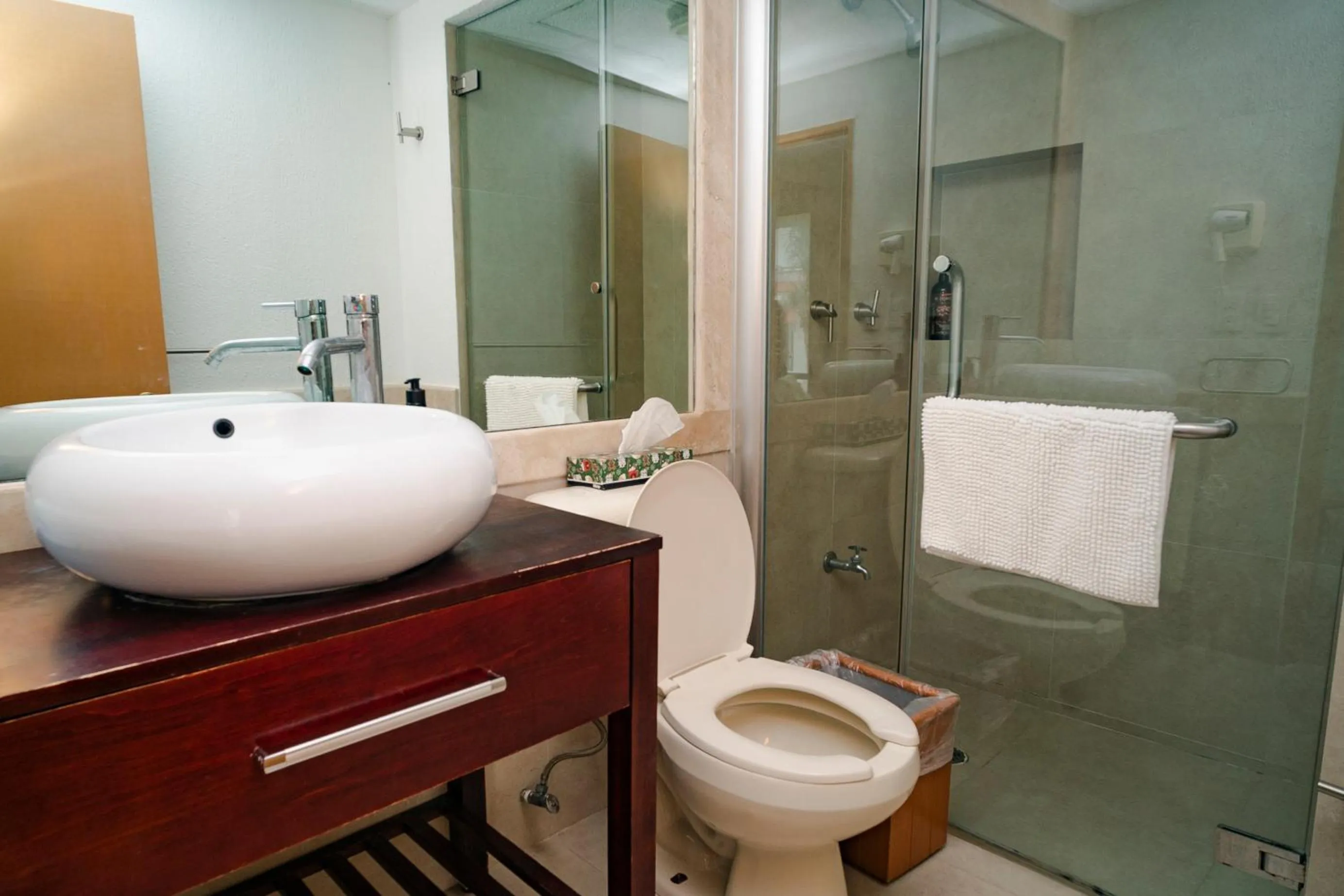 Bathroom in Oceanfront condo at voted best Cancun sandy beach