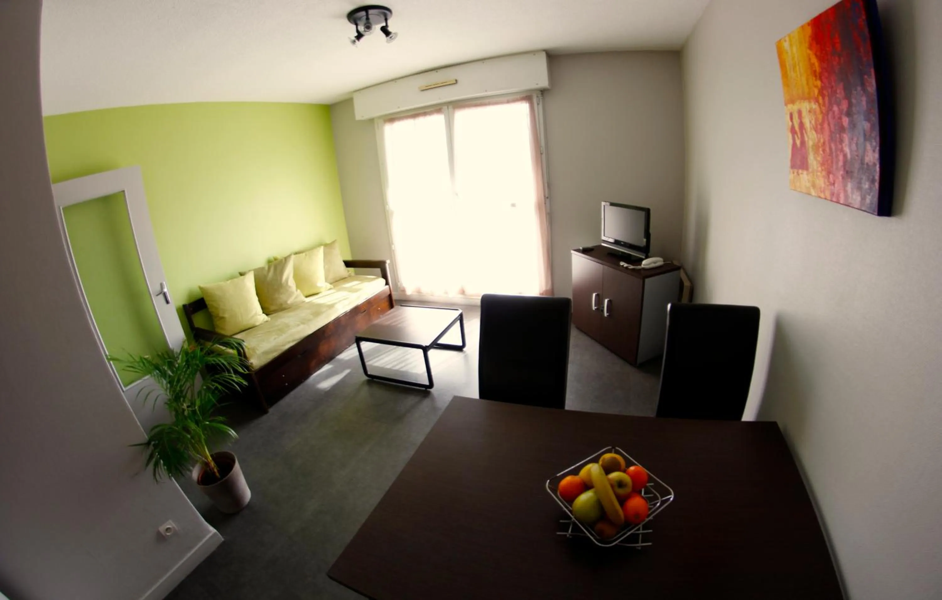 Photo of the whole room in Appart'hotel Les Palatines