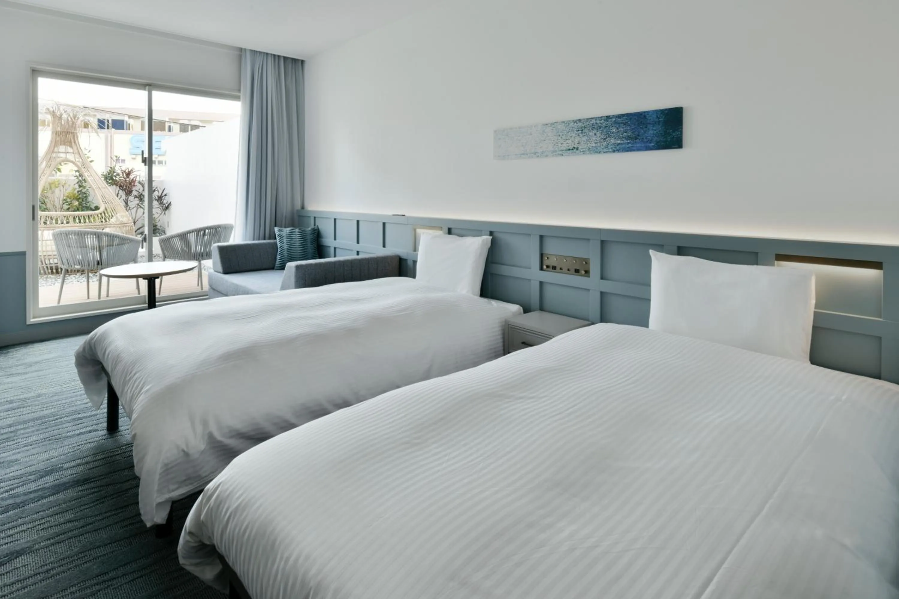 Bed in Lequ Okinawa Chatan Spa ＆ Resort