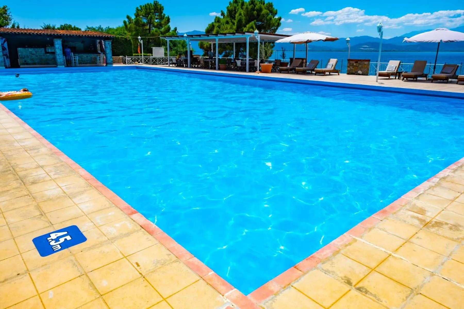 Swimming pool in Tsamadanis Hotel & Bungalows Friends Family