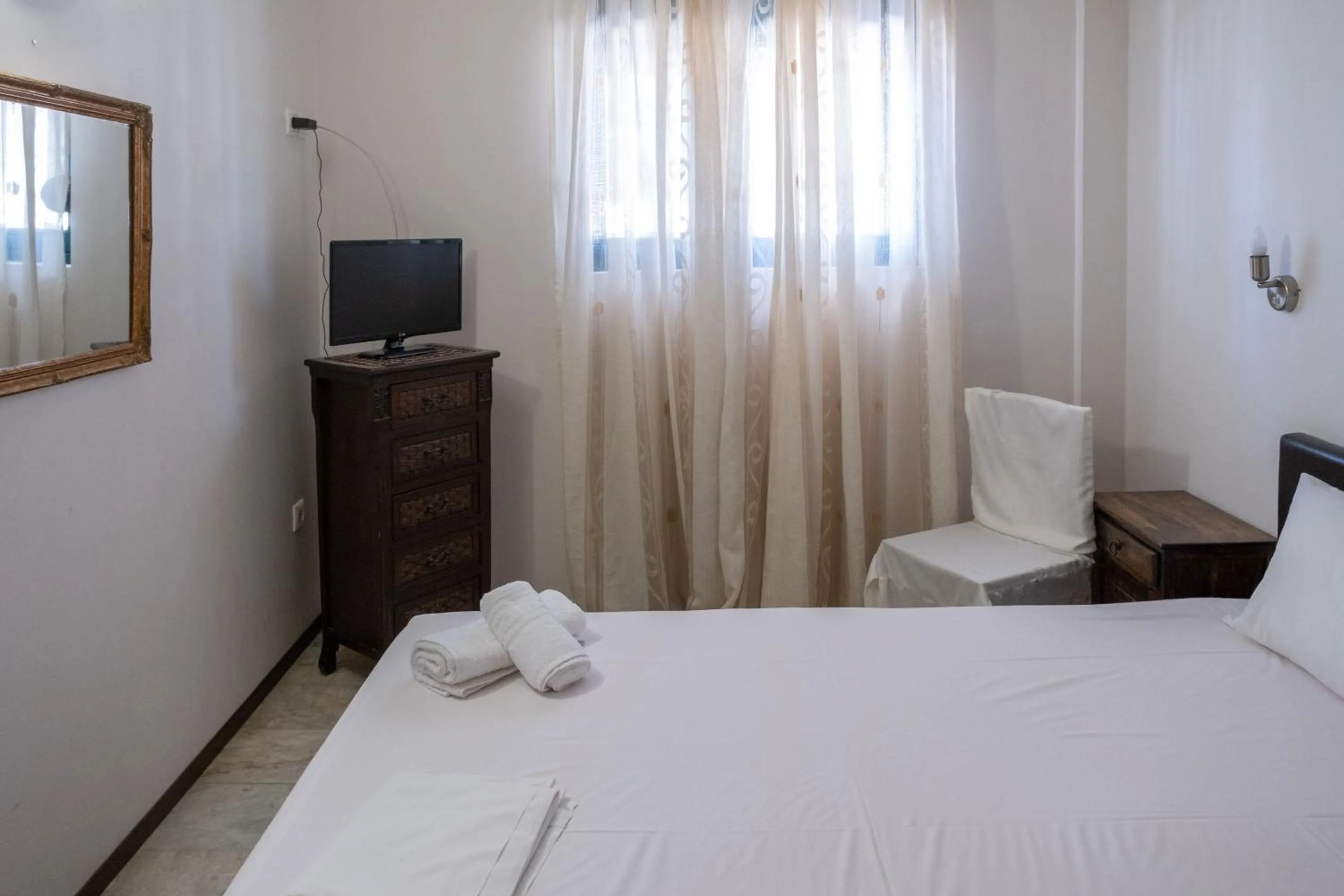 Bed in Tsamadanis Hotel & Bungalows Friends Family