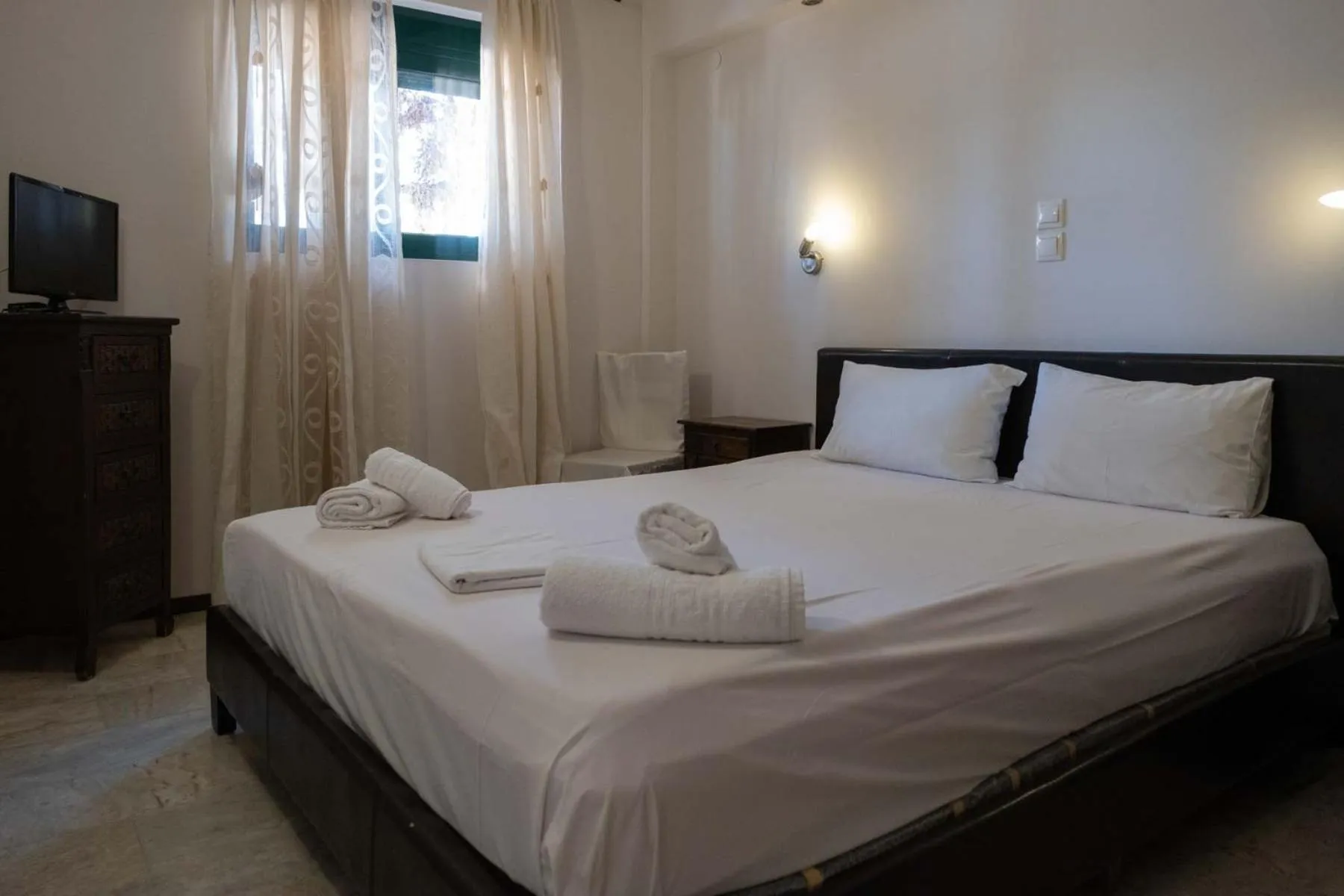 Bed in Tsamadanis Hotel & Bungalows Friends Family