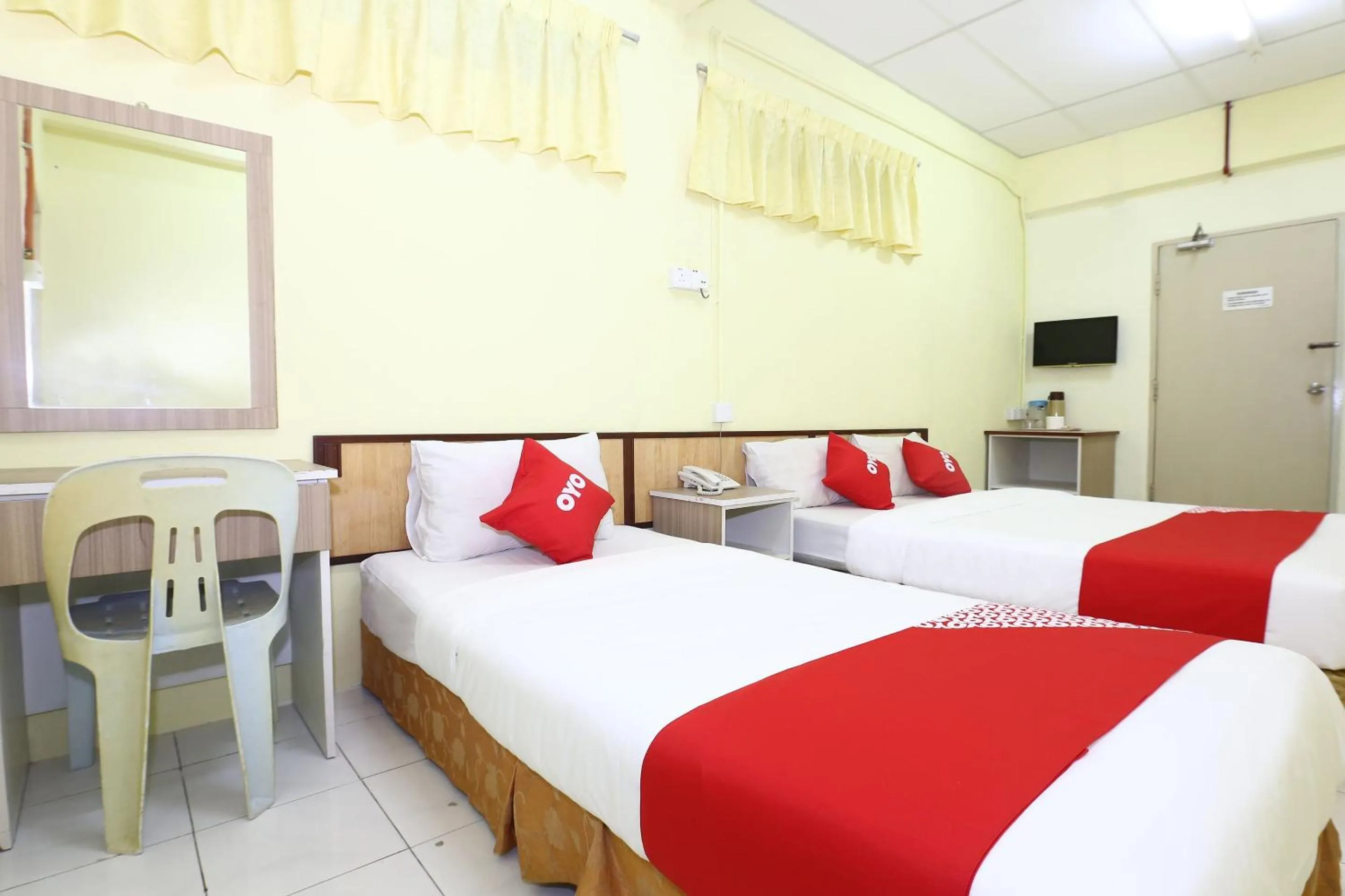 Bedroom in Hotel O Harmoni Hotel