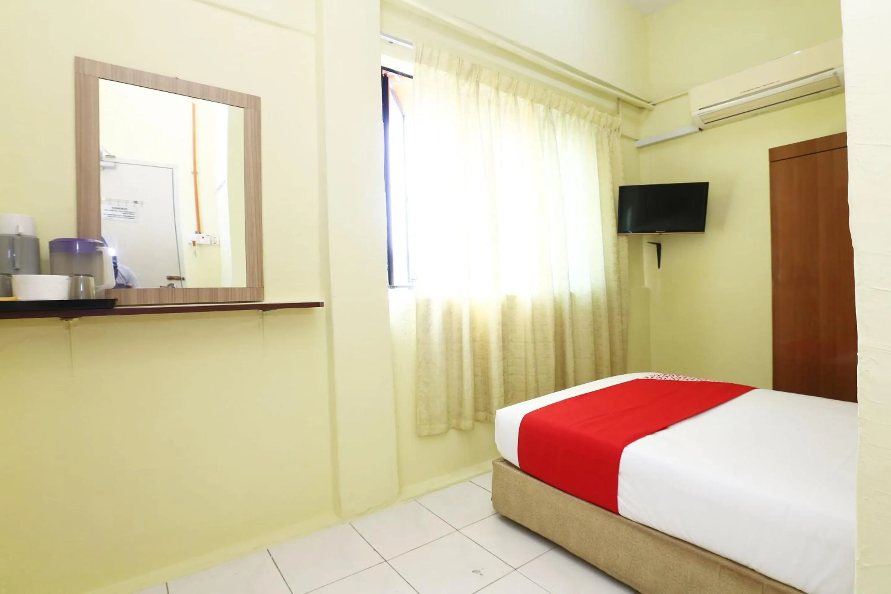 Bedroom in Hotel O Harmoni Hotel