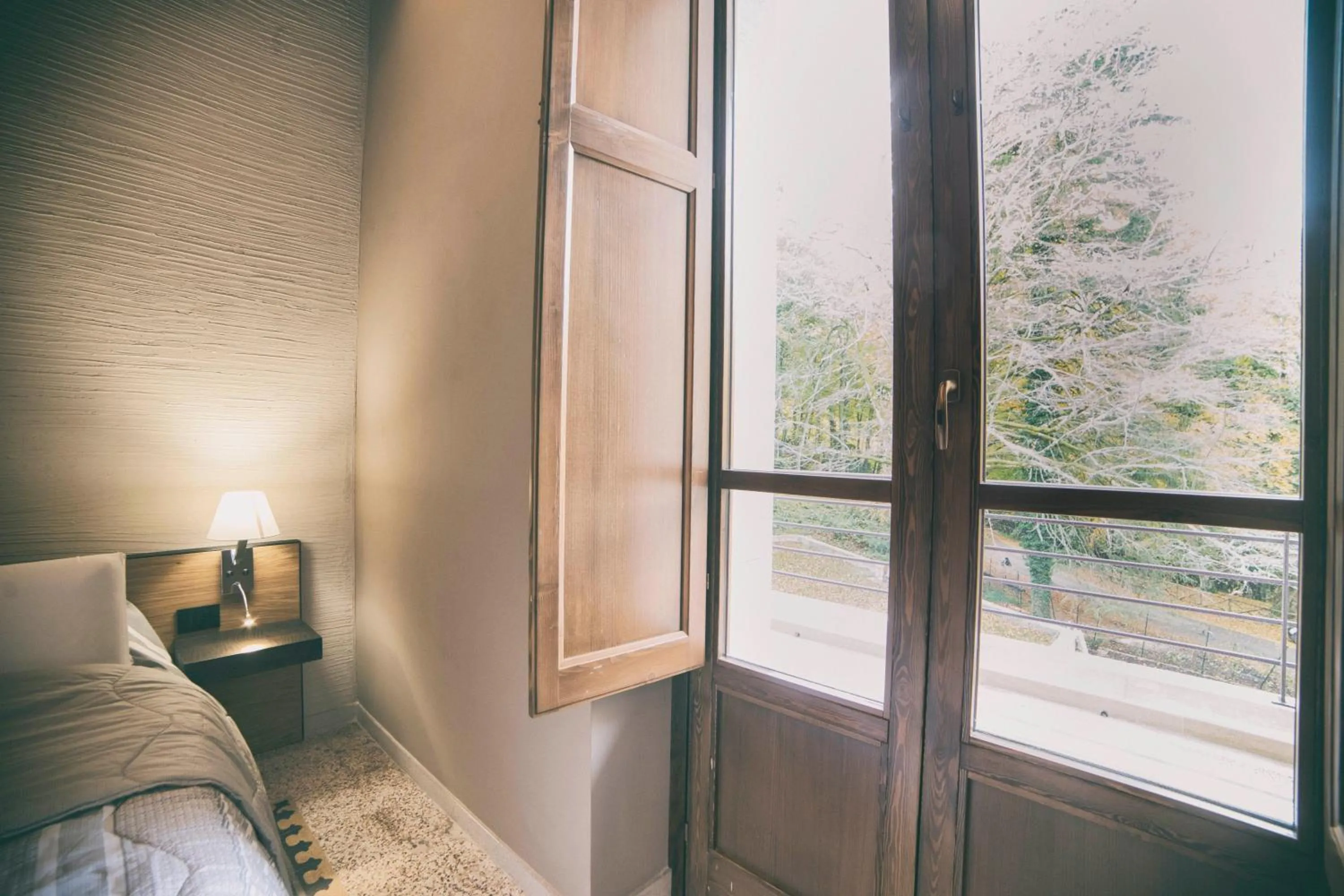 Garden view, Bed in Elda Hotel