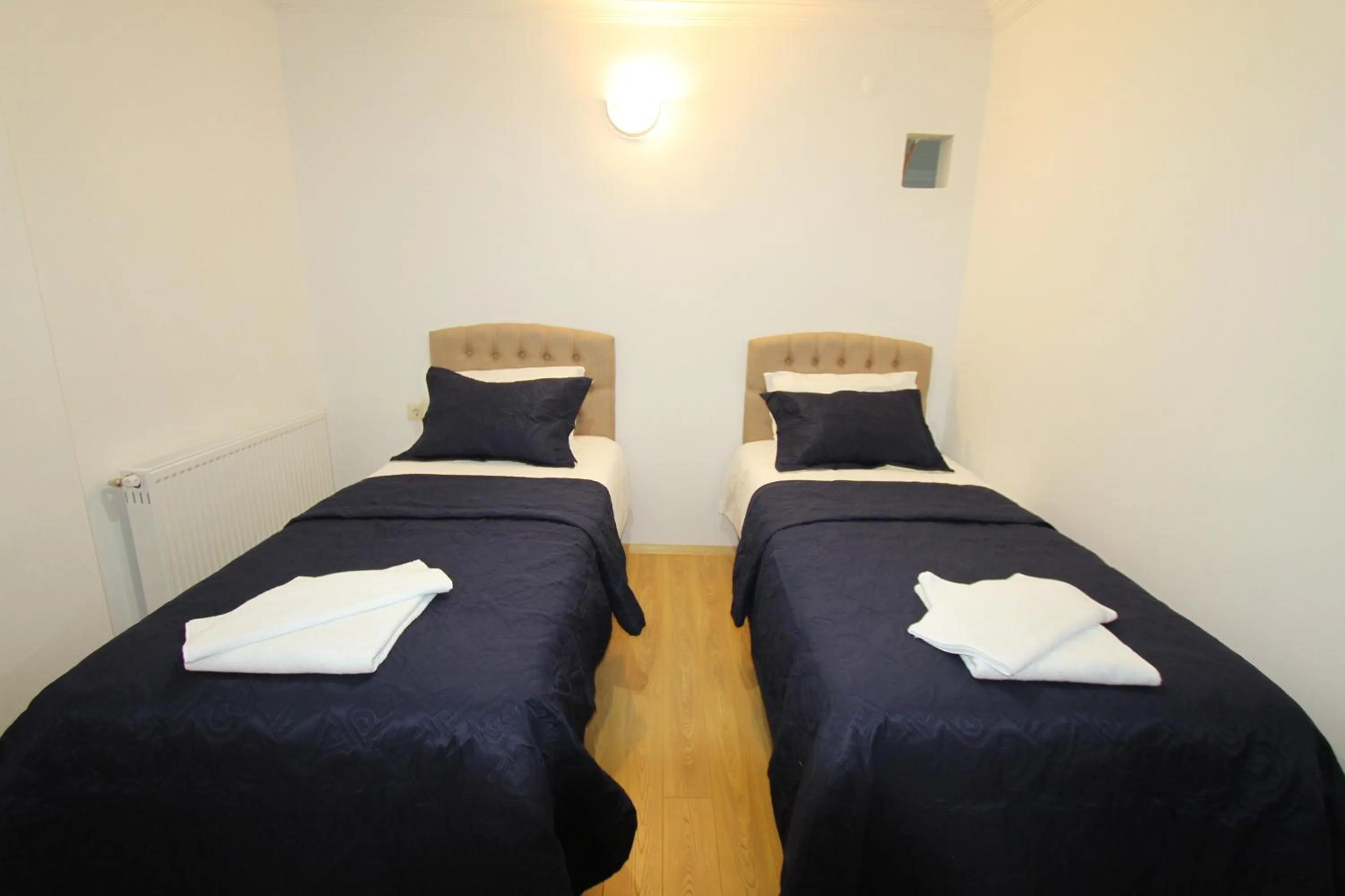 Bed in Asmir Suites Hotel