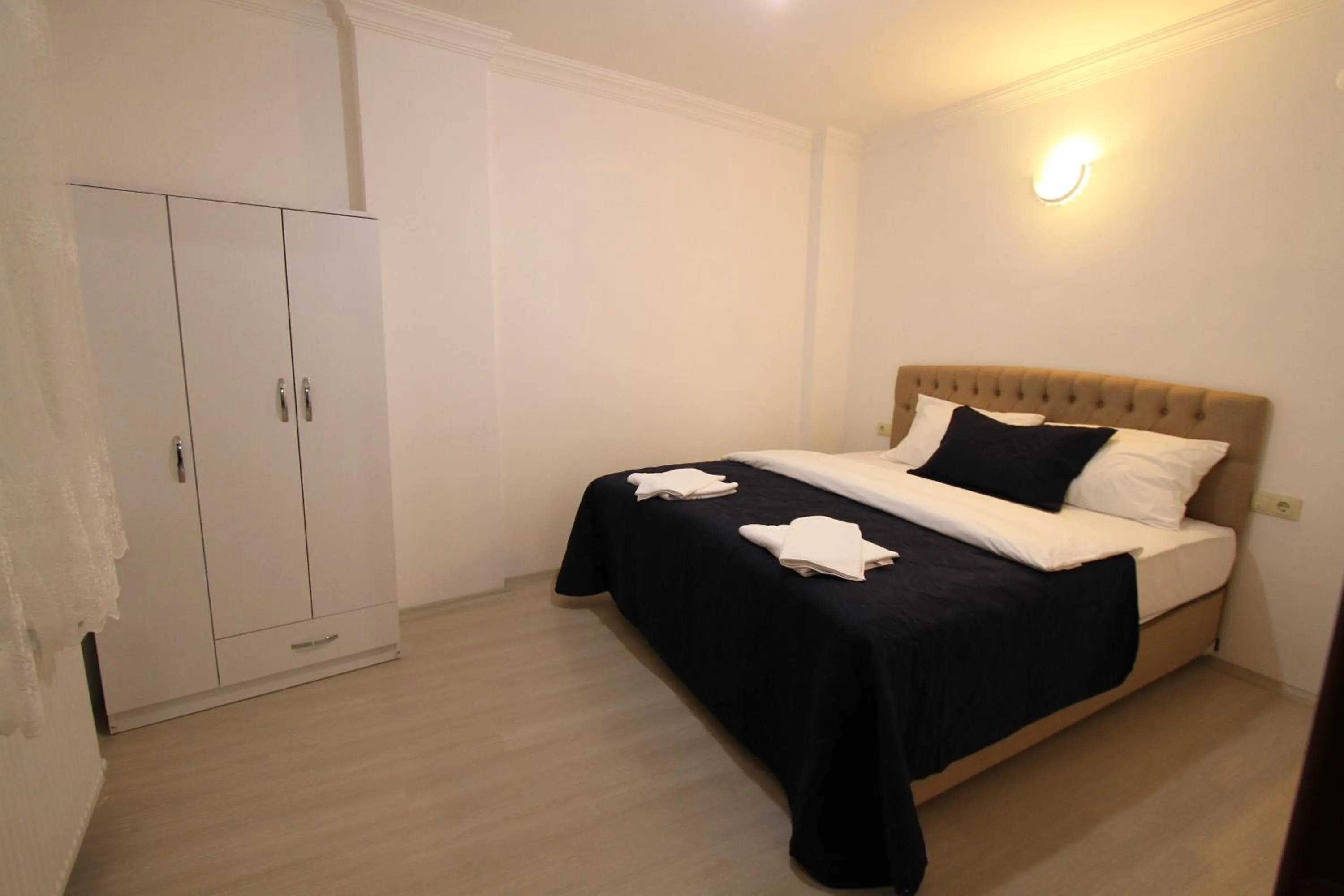 Bed in Asmir Suites Hotel