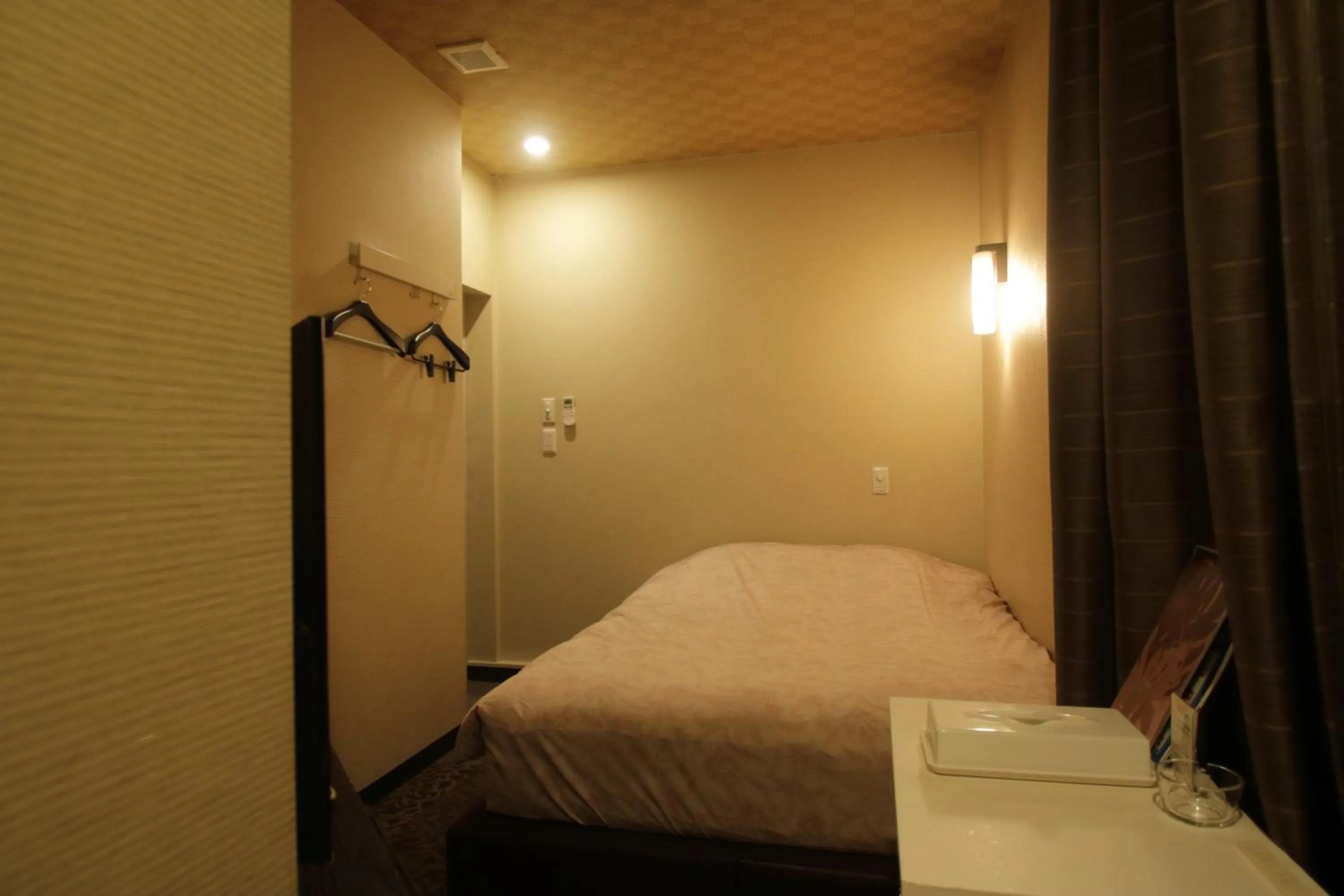 Bed in Tokyo Tourist Inn