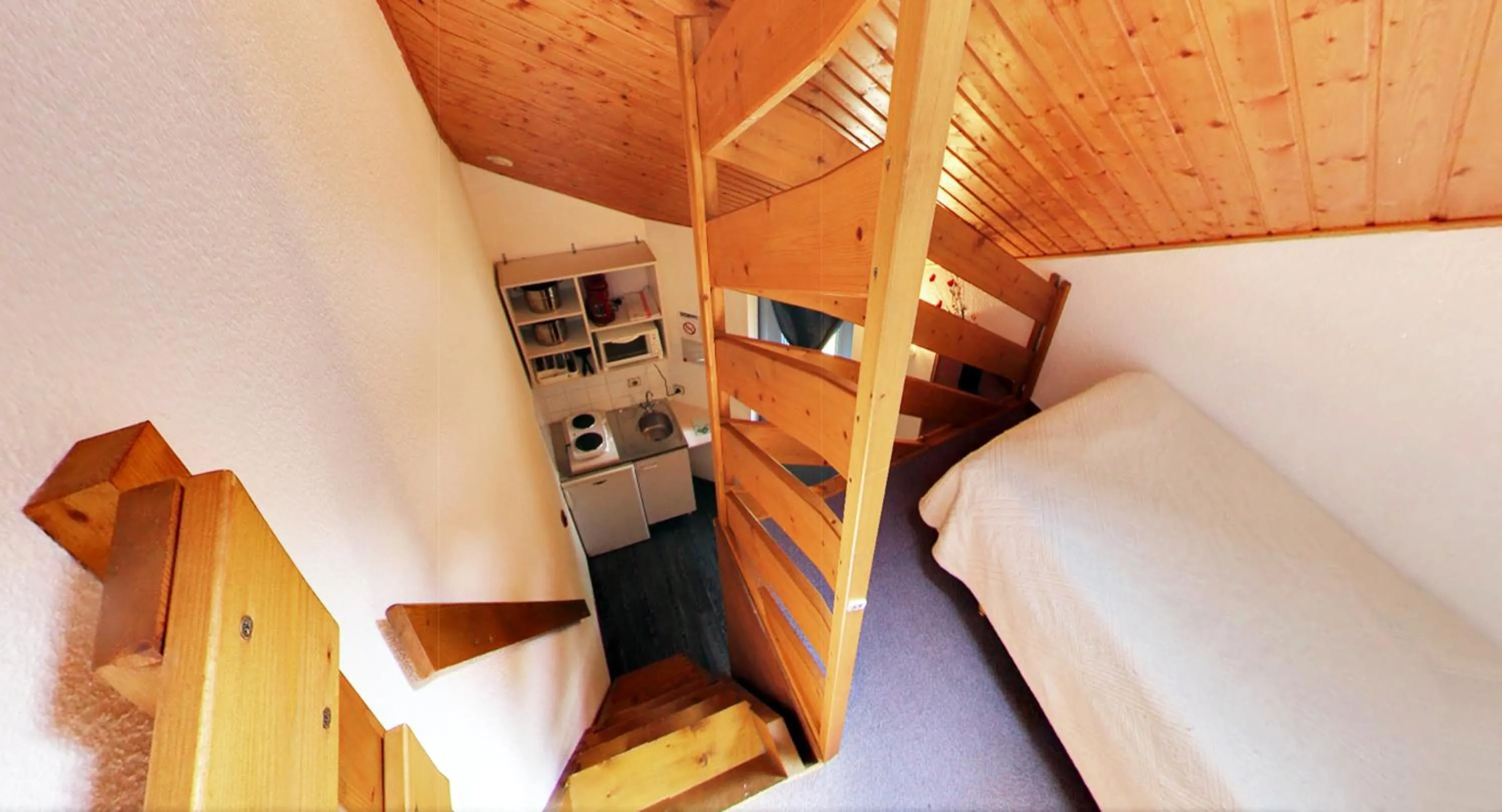 Kitchen or kitchenette, Bed in Hôtel de la baie de Paimpol