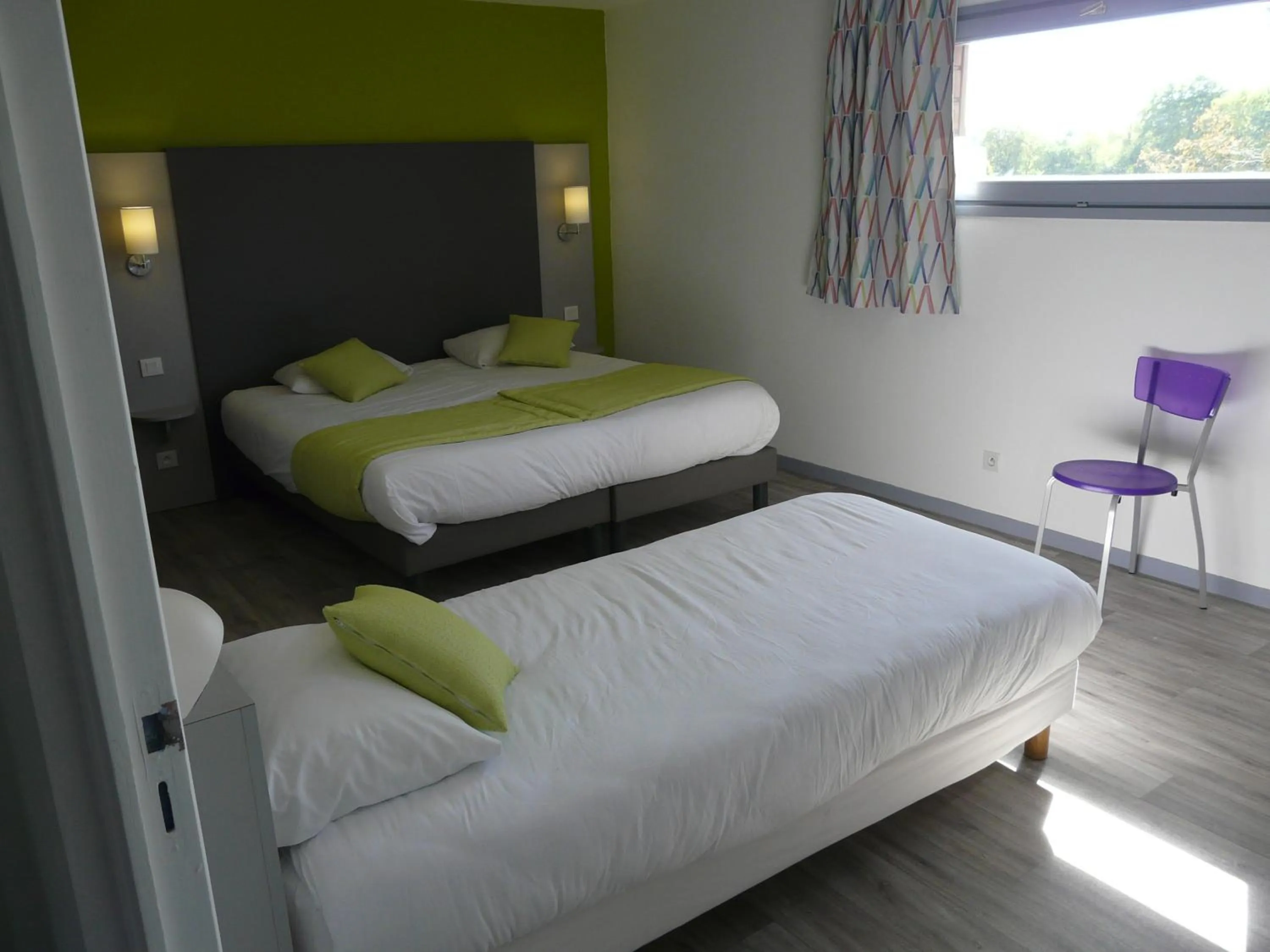 Bed in Hôtel de la baie de Paimpol