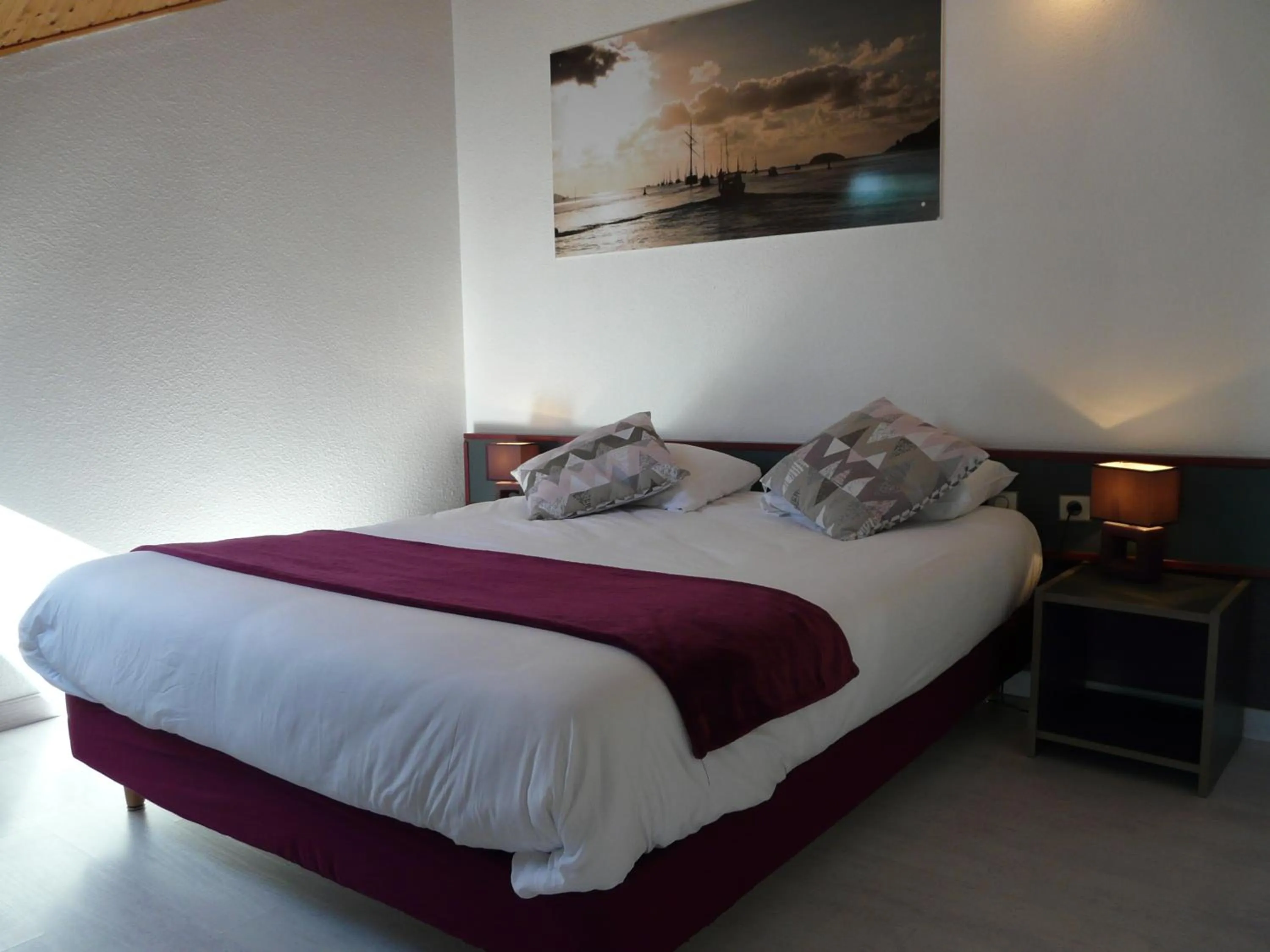 Bed in Hôtel de la baie de Paimpol