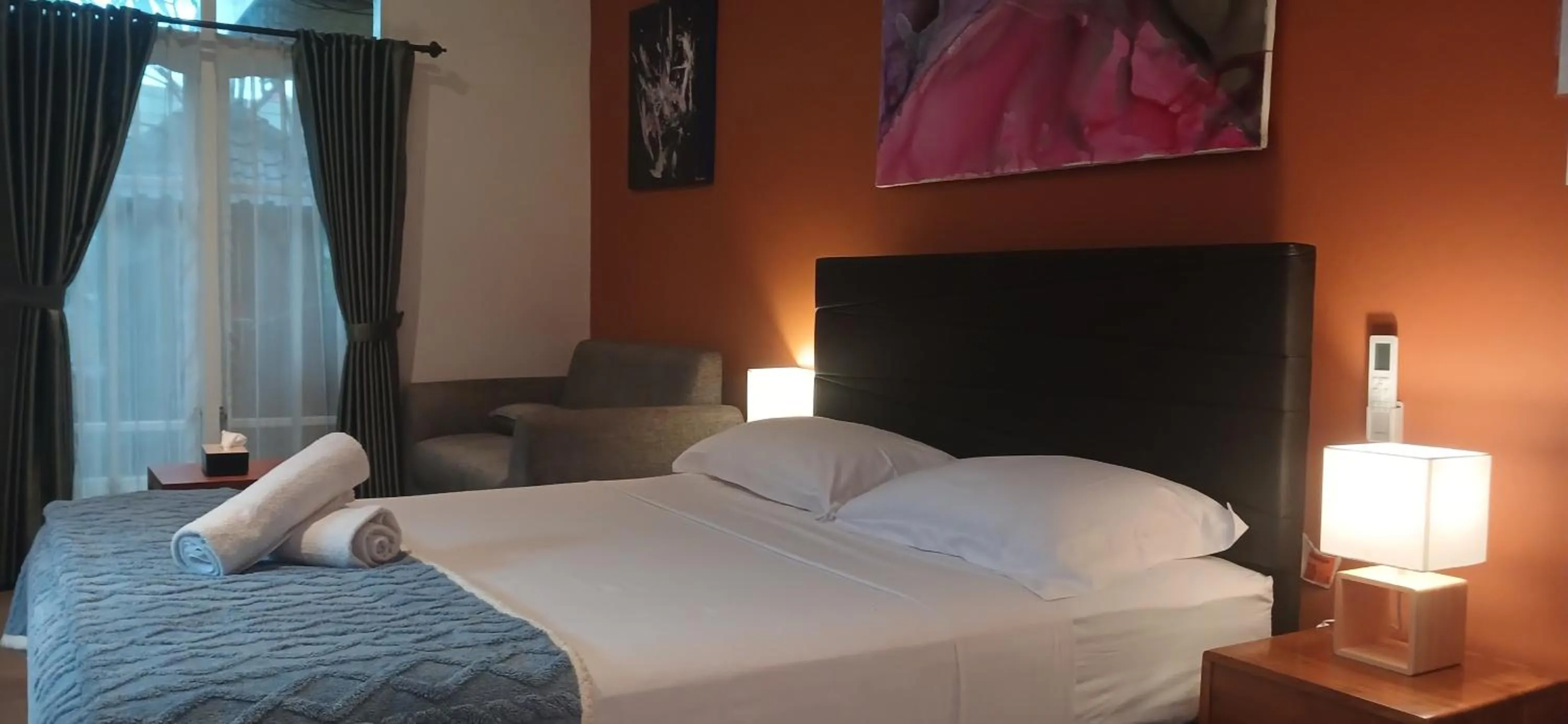 Bed in Dewi Sri Guesthouse