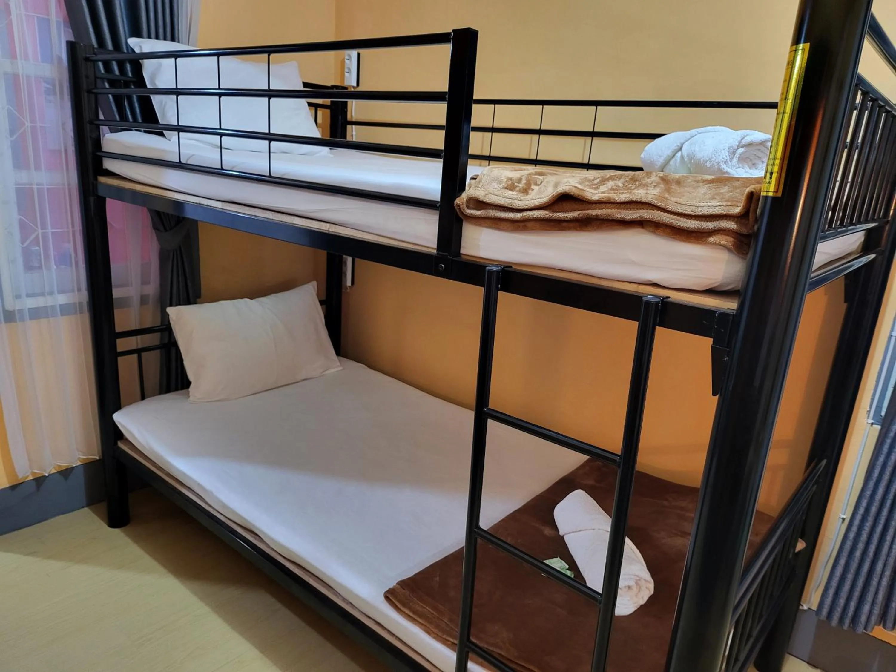 Bedroom, Bed in Dewi Sri Guesthouse