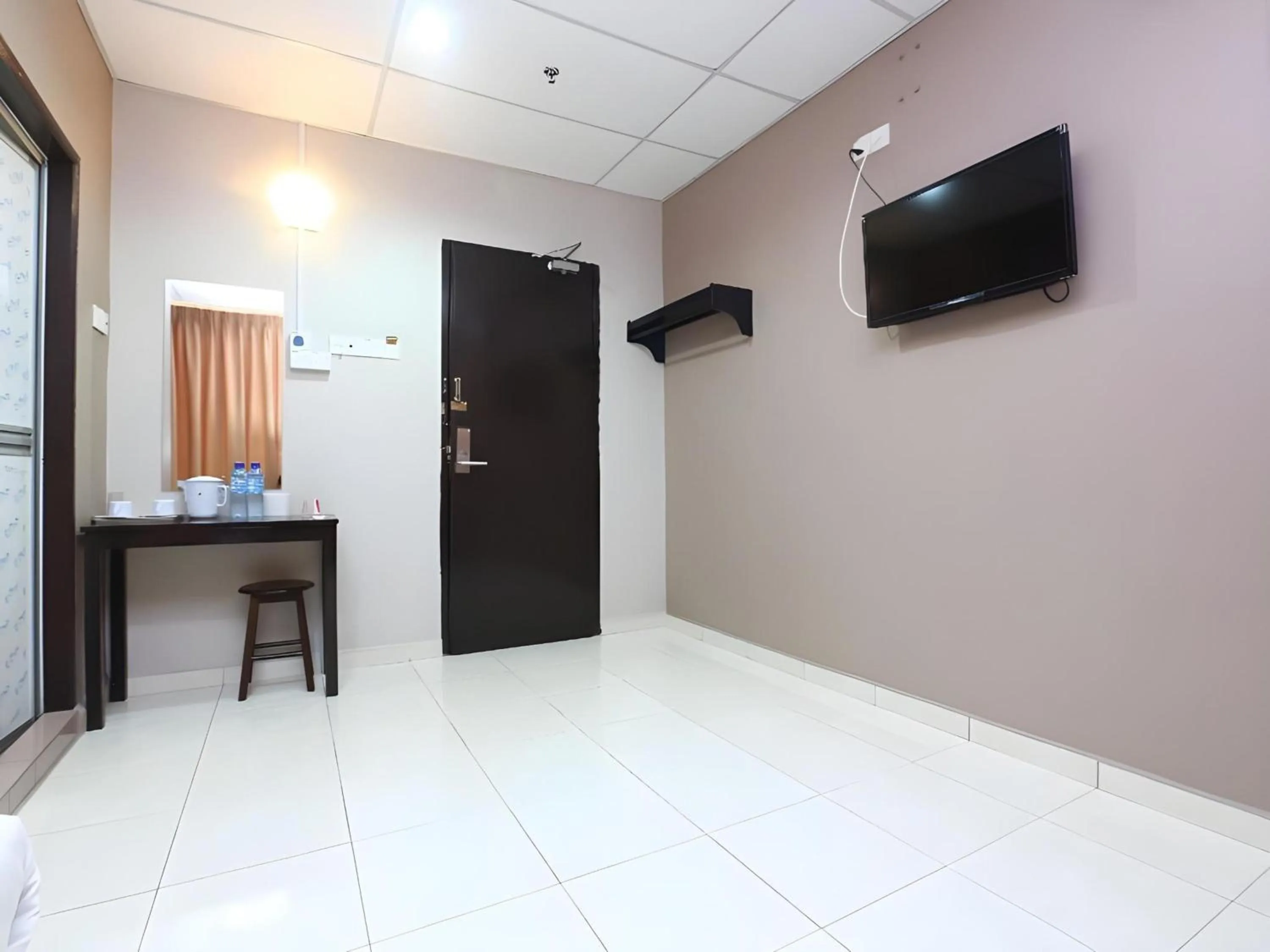 Photo of the whole room in Hotel O Destiny Riverside Hotel