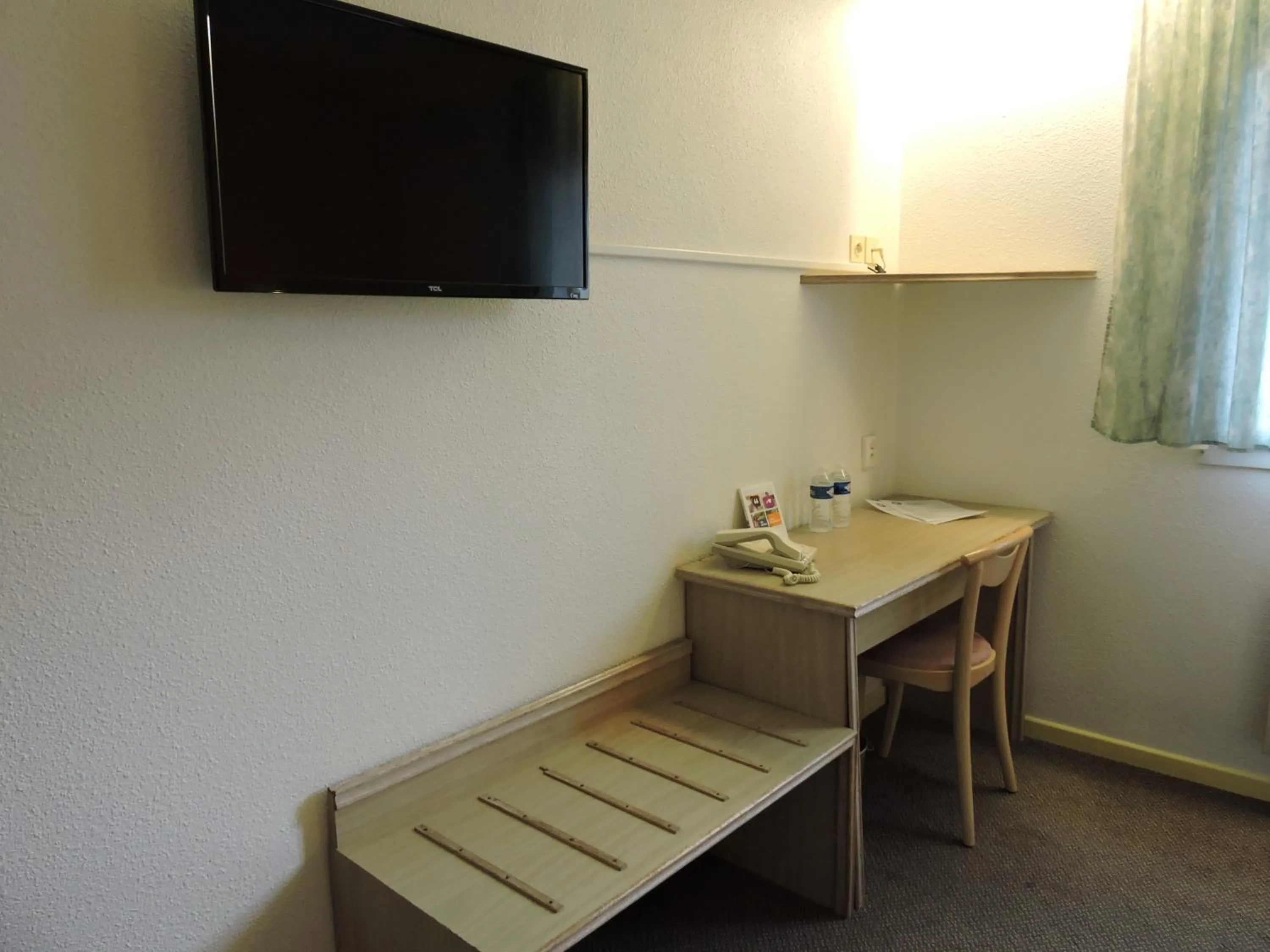 Bedroom in Hotel le Foron