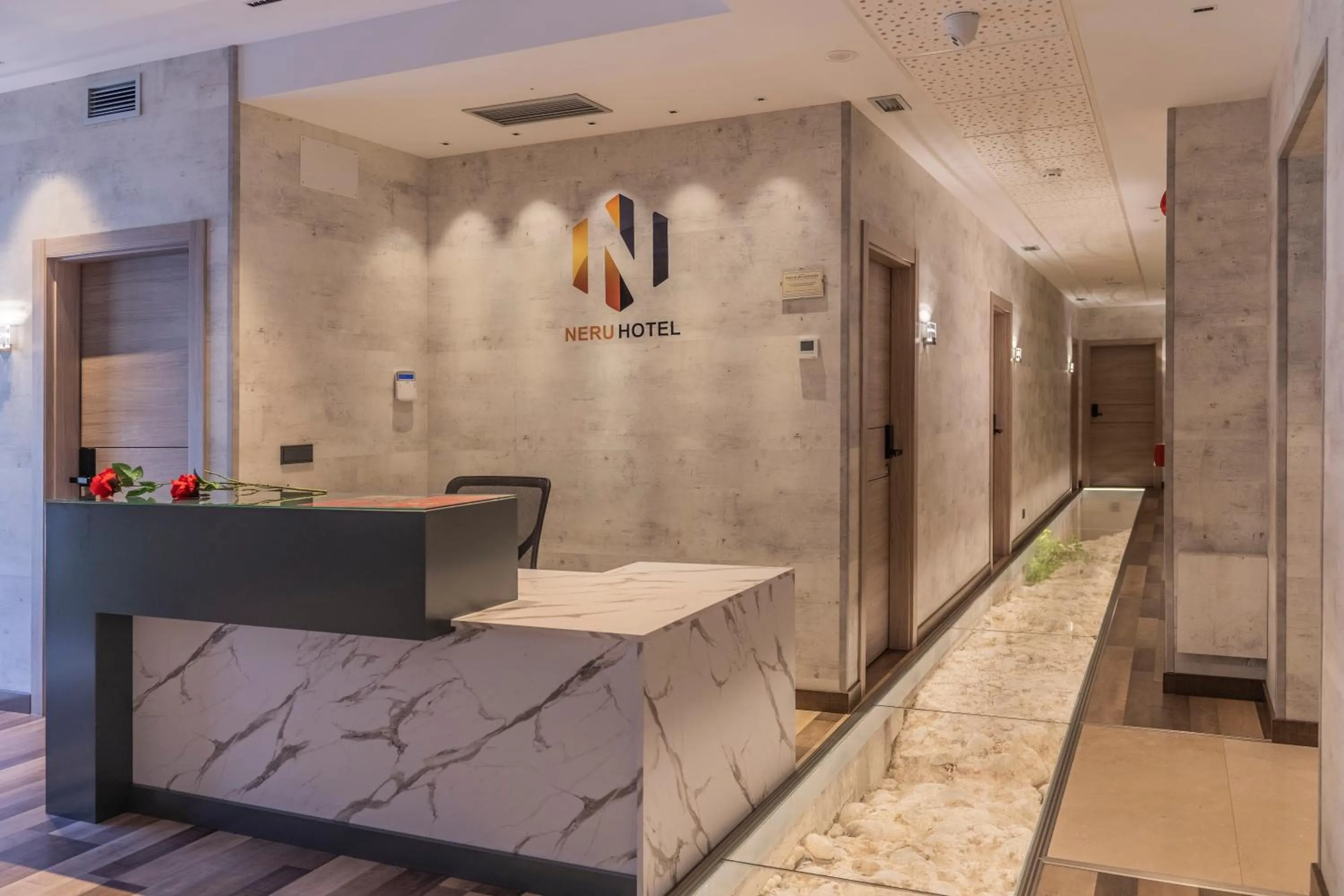 Lobby or reception in Hotel NERU con Encanto