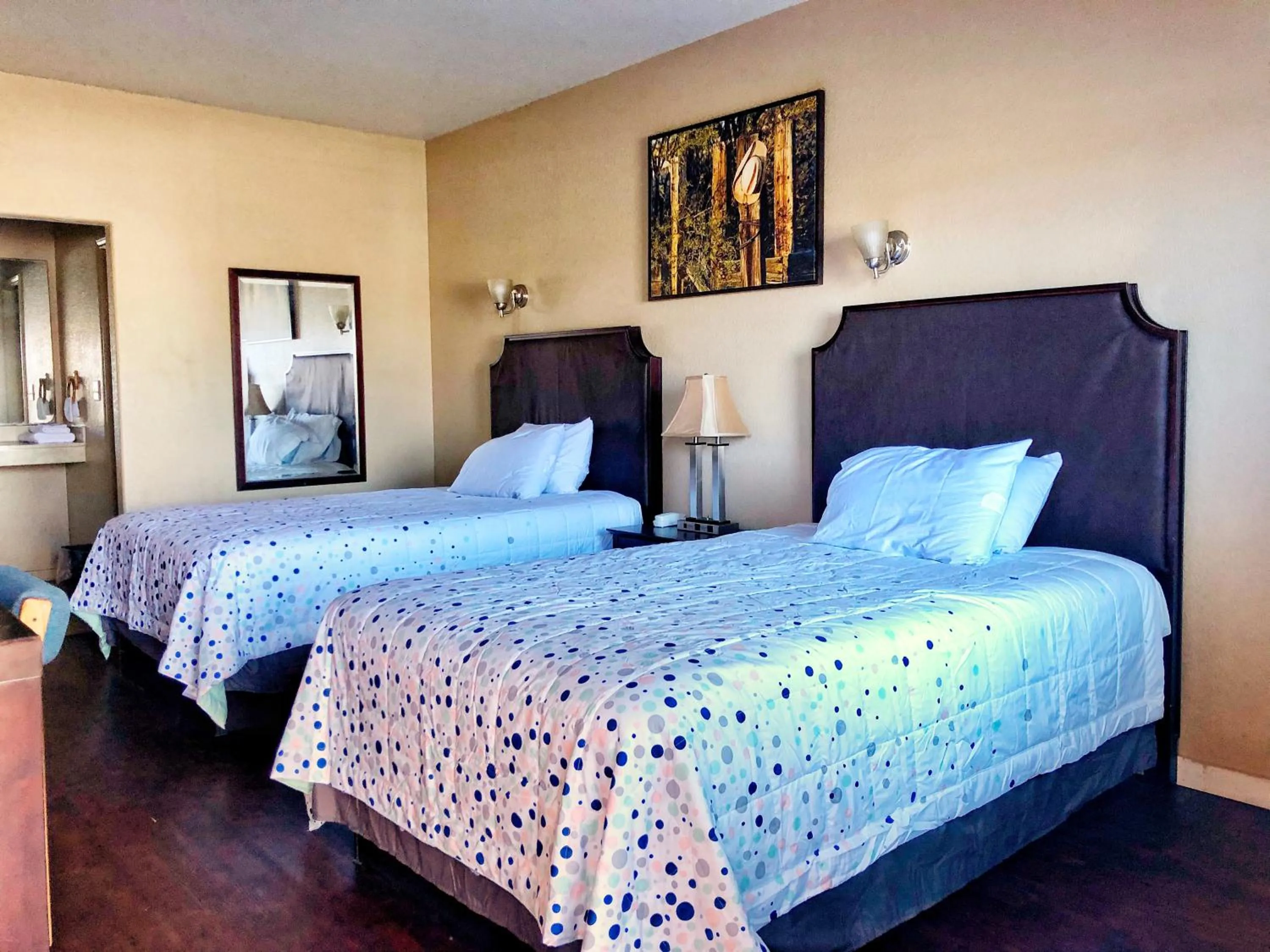 Bedroom in Lone Star Inn & Suites