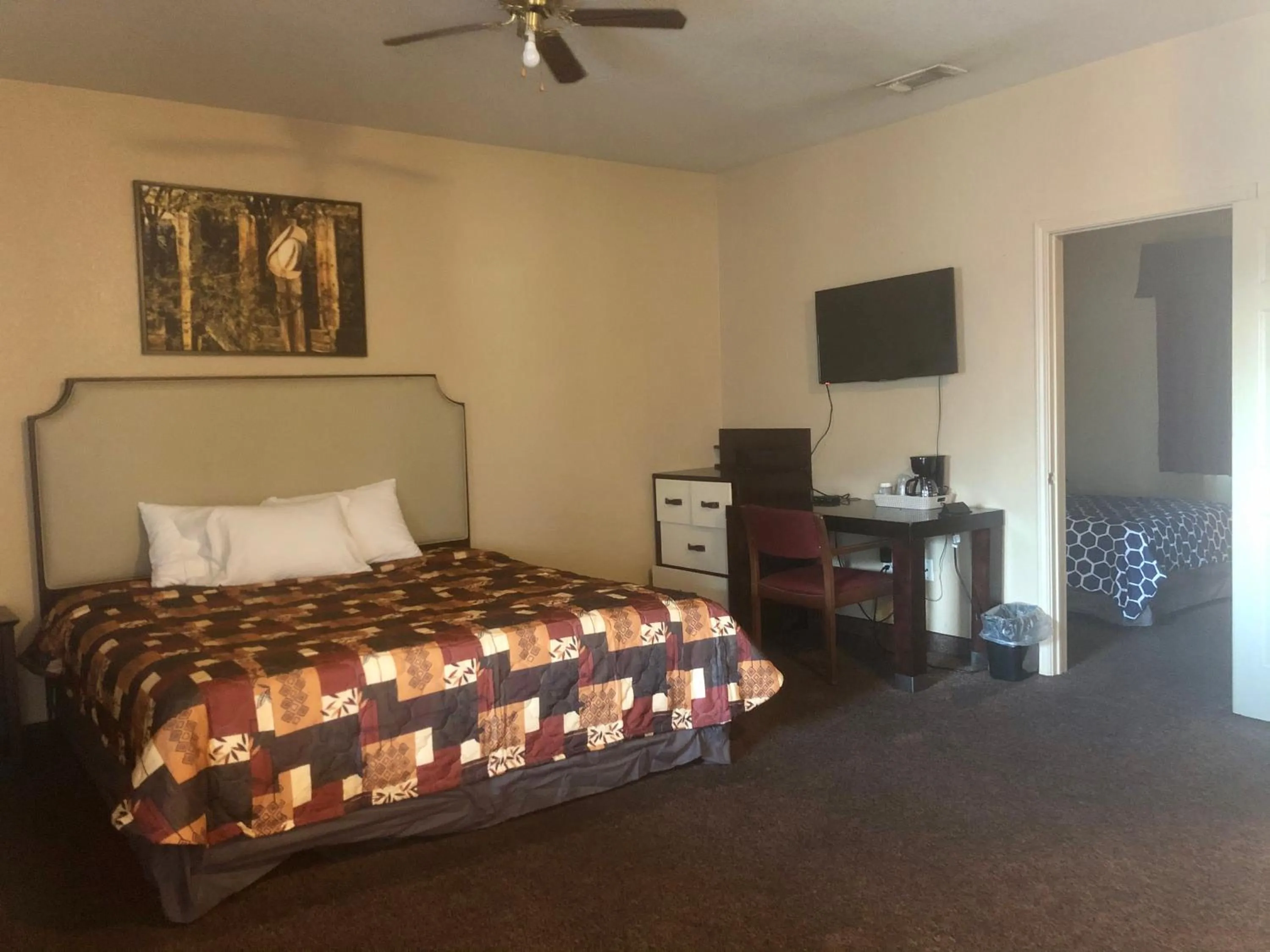 Bedroom in Lone Star Inn & Suites