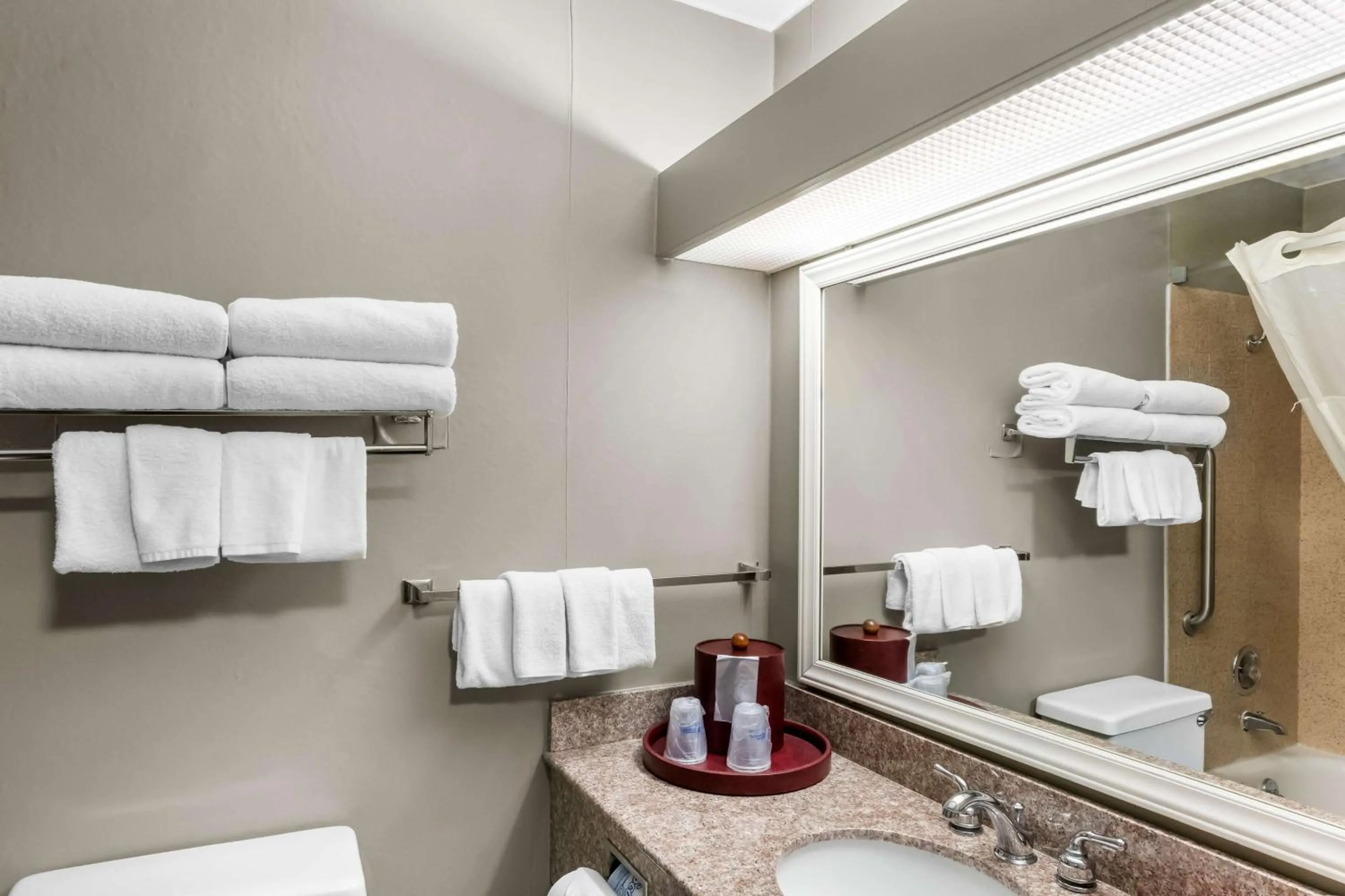 Bathroom in SureStay Hotel by Best Western SeaTac Airport North