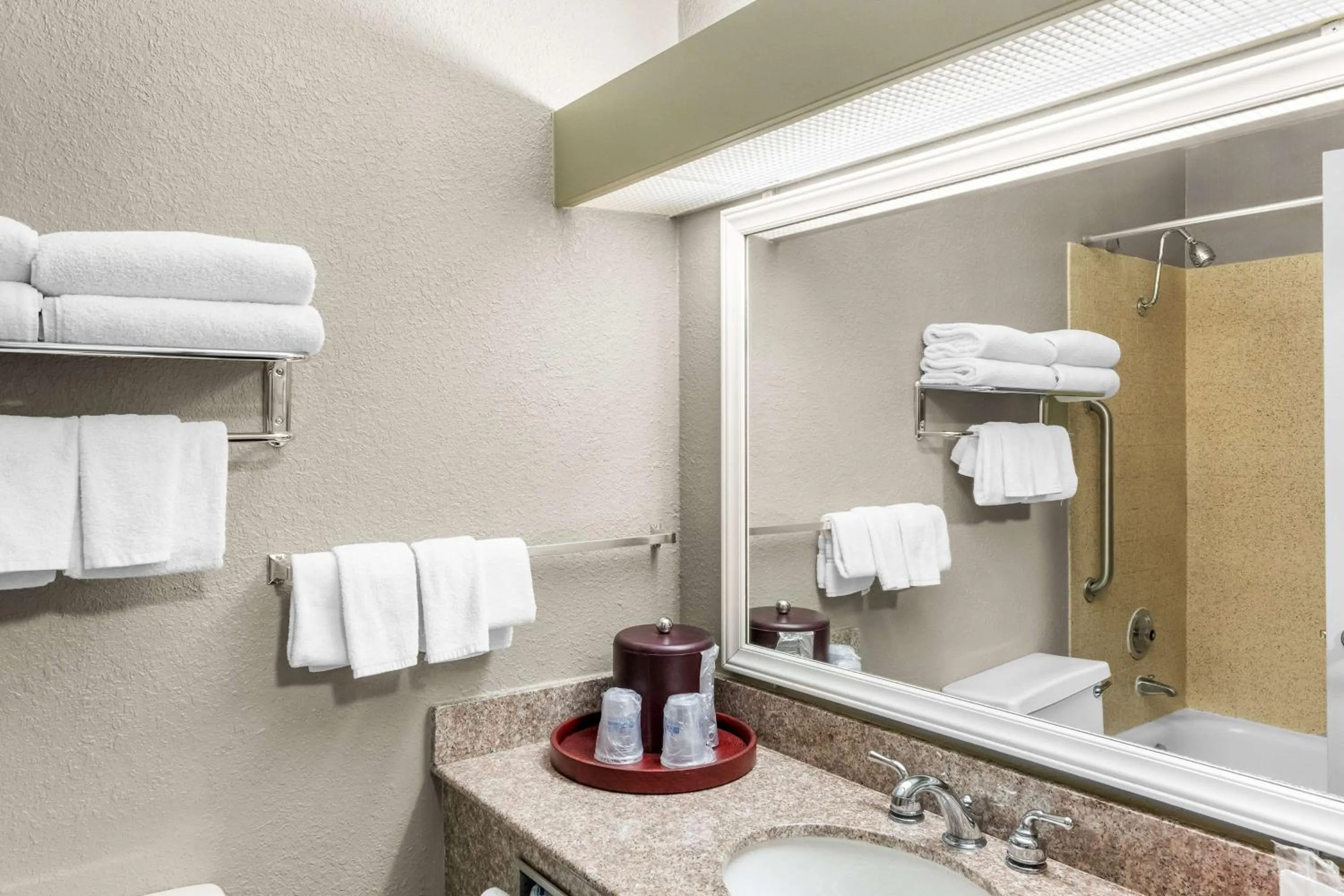 Bathroom in SureStay Hotel by Best Western SeaTac Airport North