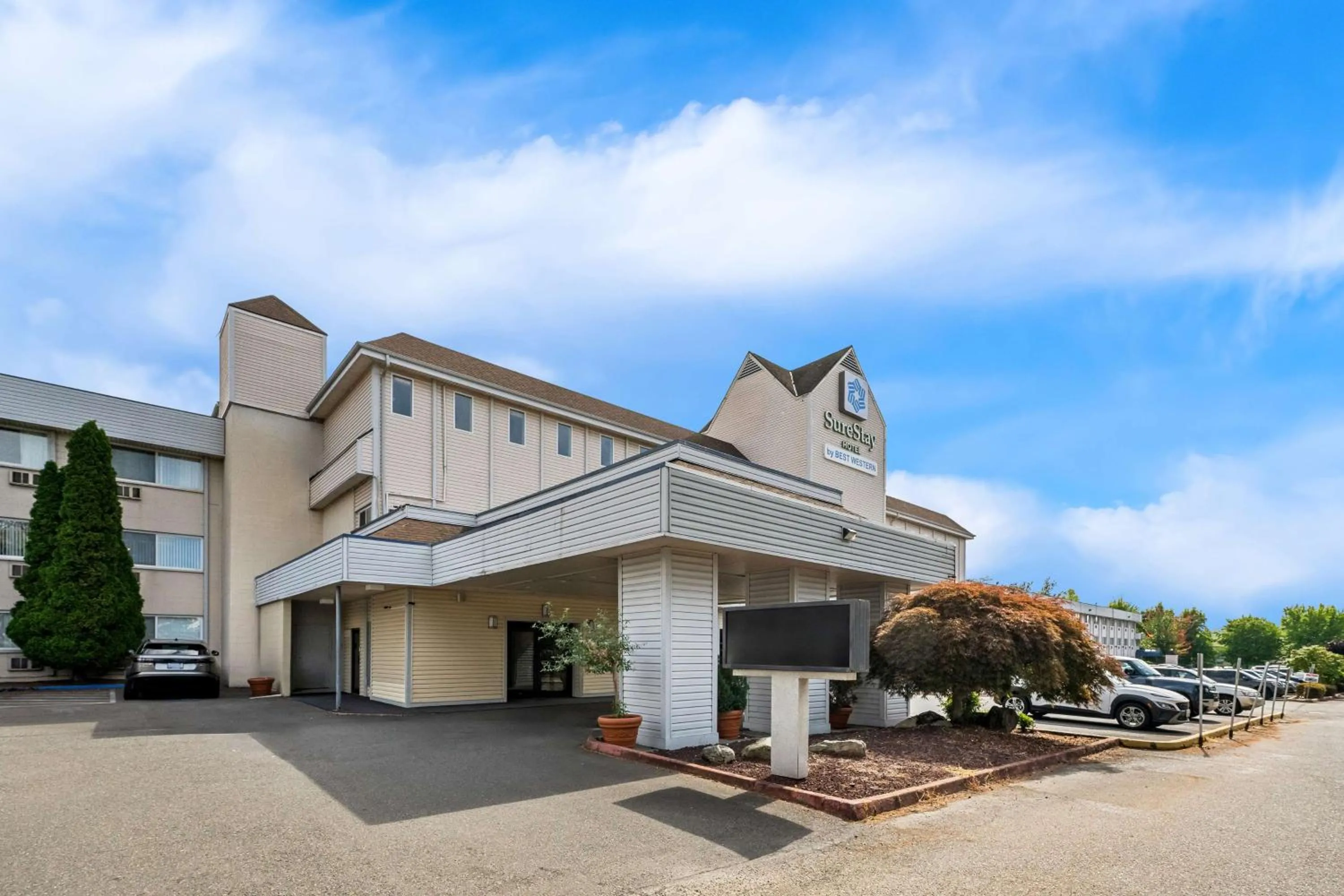 Property building in SureStay Hotel by Best Western SeaTac Airport North