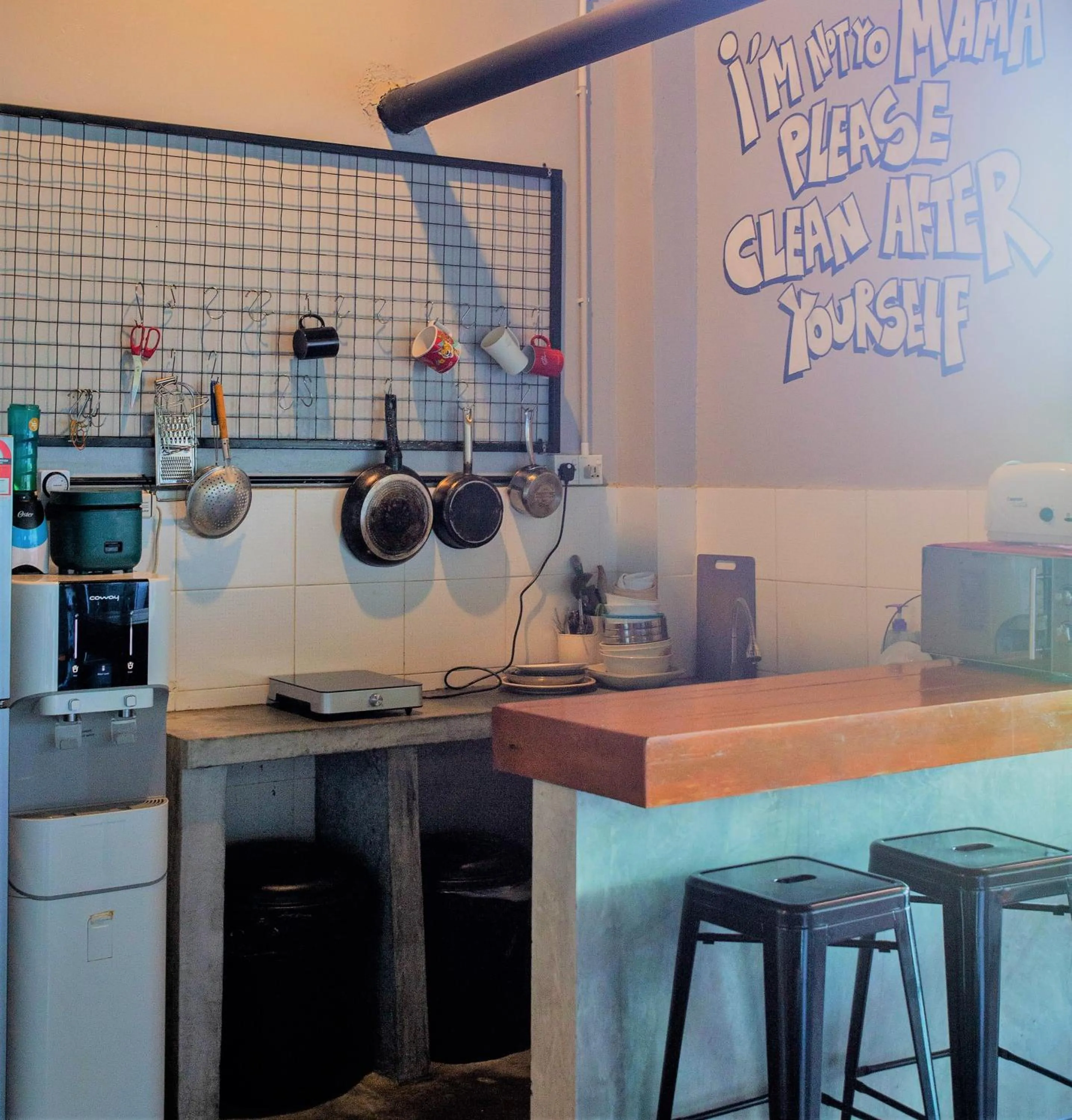 Communal kitchen in Bed Attitude Hostel Cenang